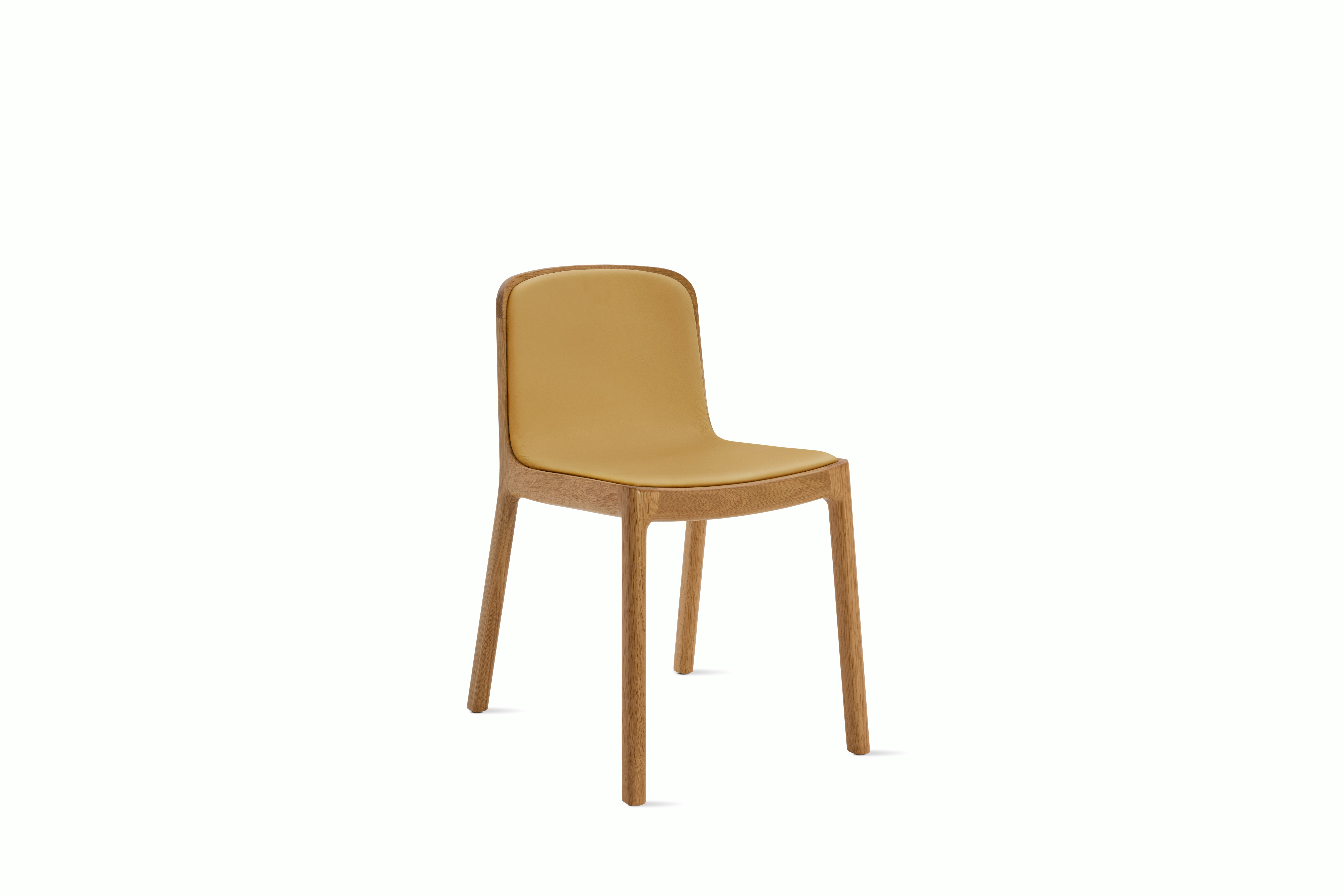 A Lijn Side Chair in Yarrow Oak viewed from an angle.