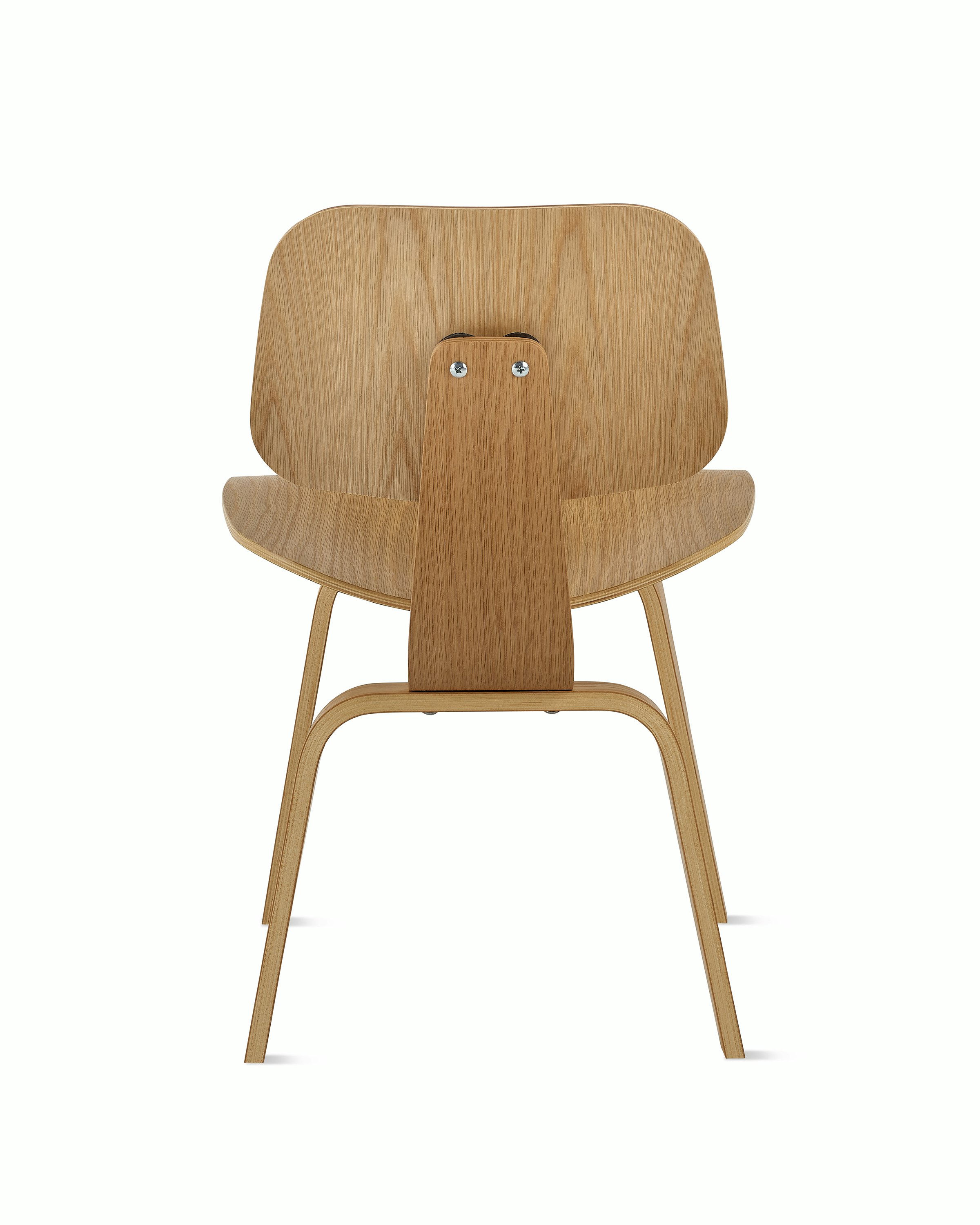 An Eames Molded Plywood Dining Chair in White Oak viewed from the back