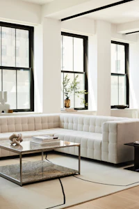 A contract lounge seating area with Rapport Sofa and H Frame Coffee Table.