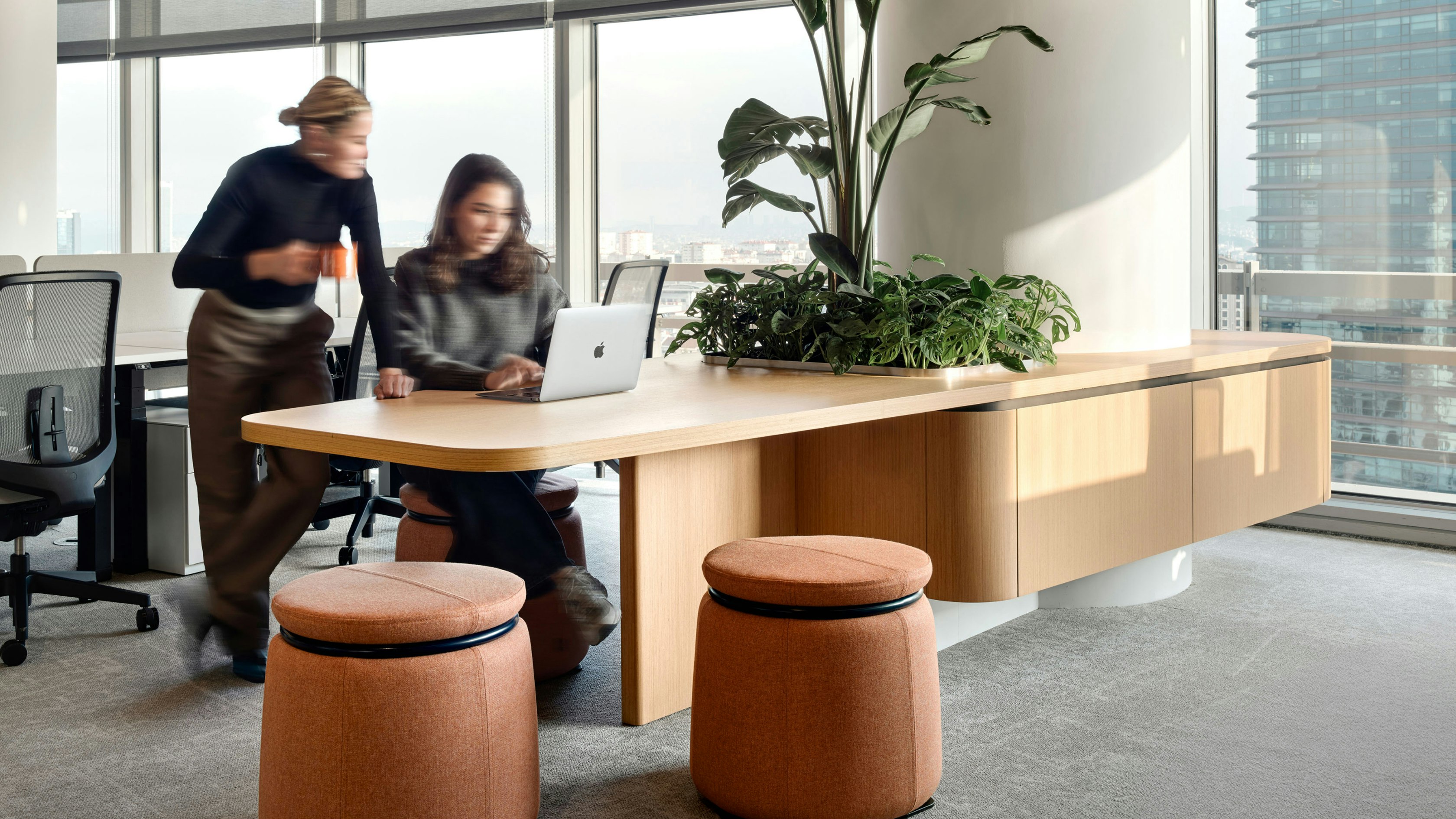 Workspace with Nevi Link and Verus Chairs with Lasso Stools scattered around.