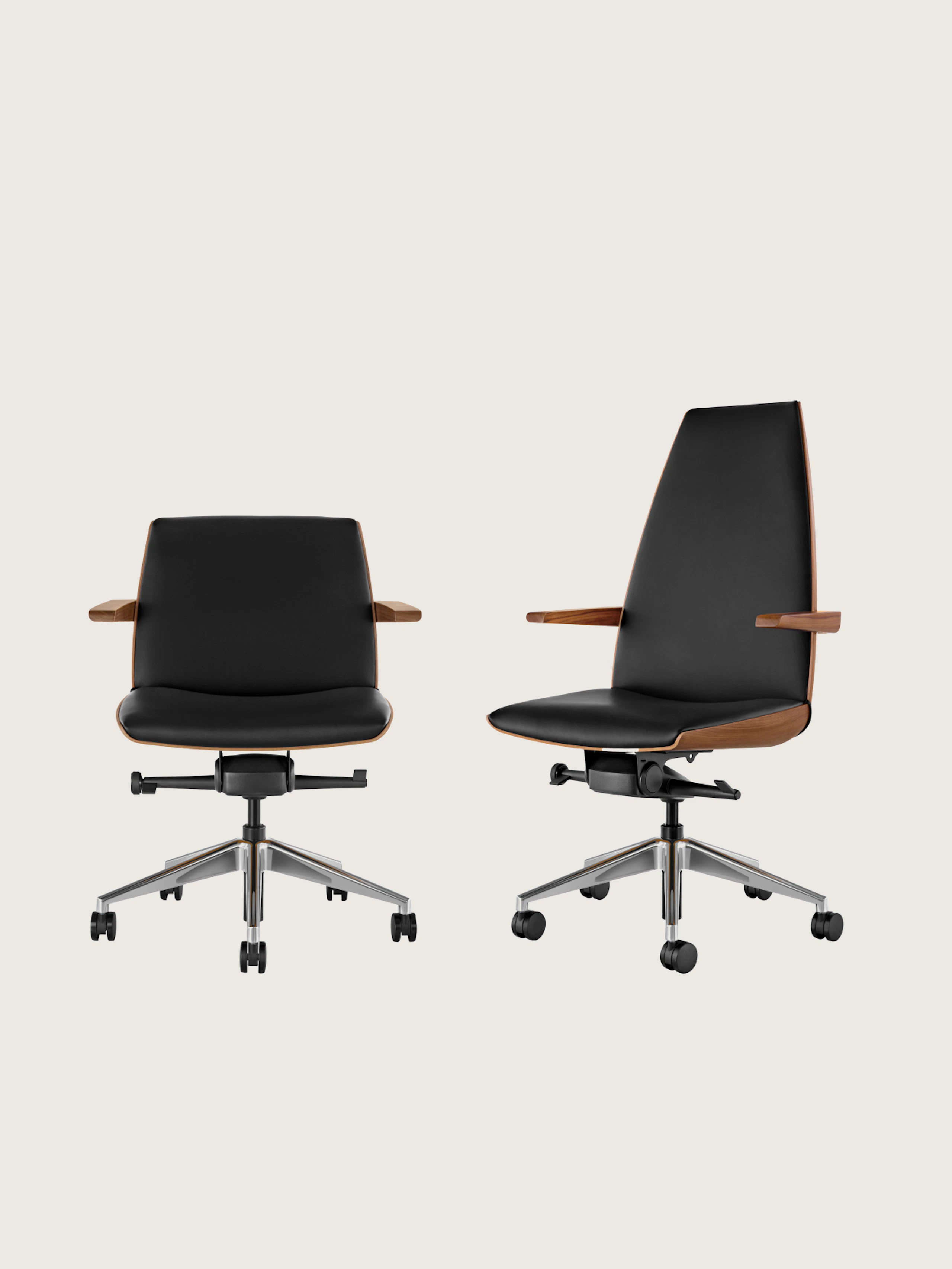 Clamshell office chairs with arms and black leather upholstery. One low back and one high back.