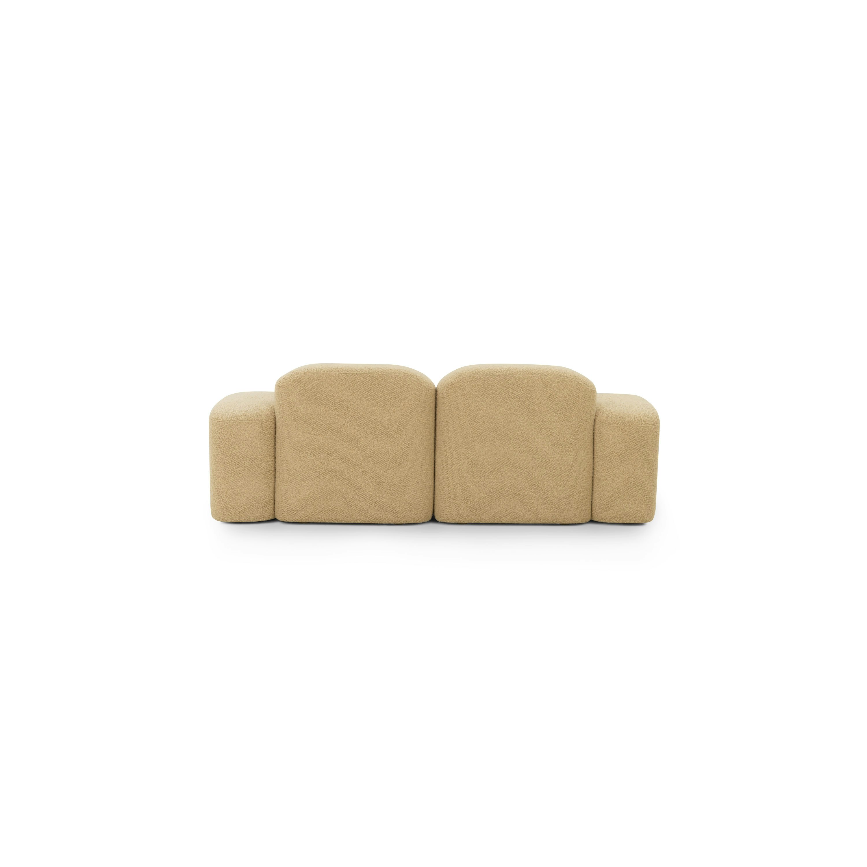 A Muse Sofa in Airlie: Camel viewed from behind.