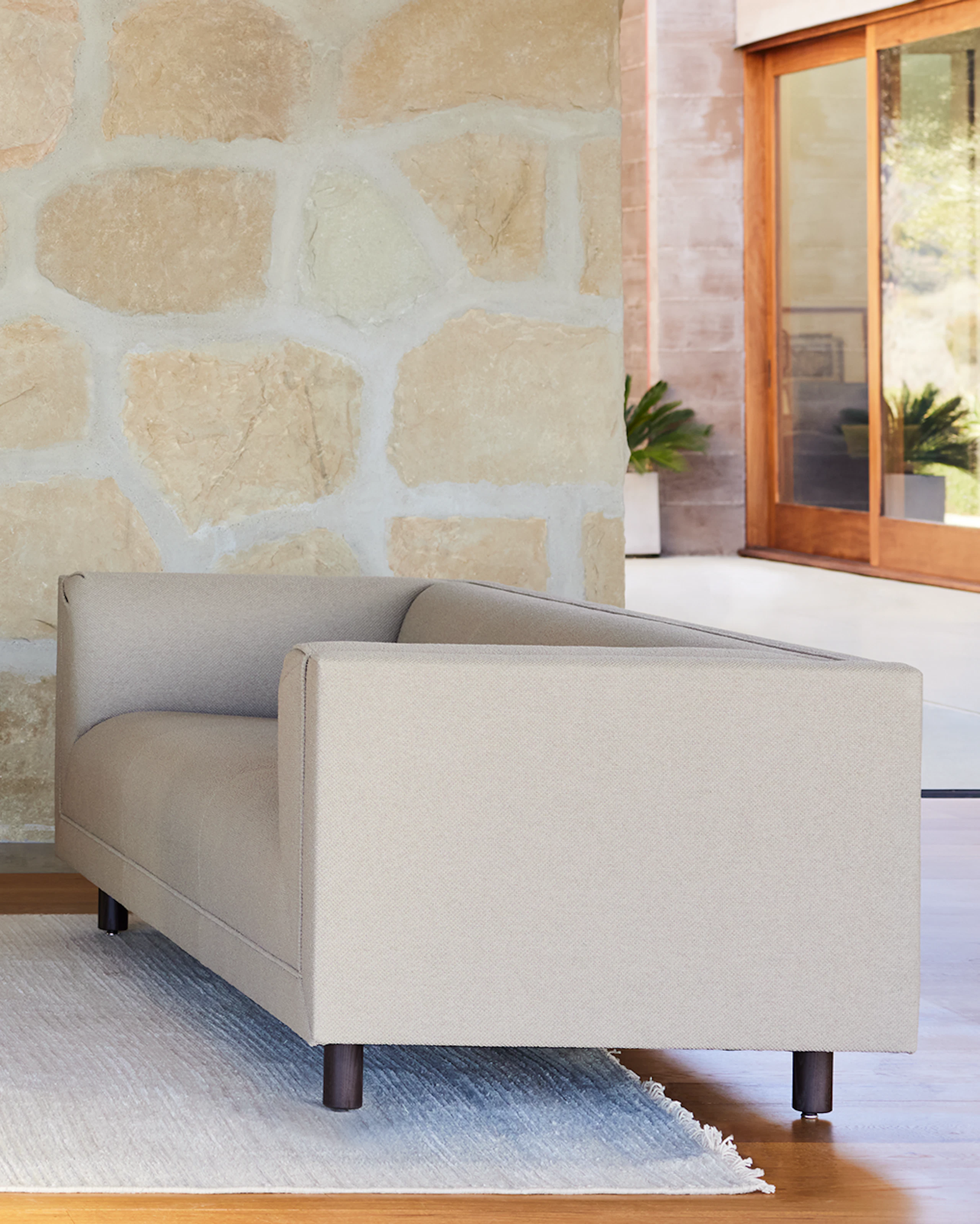 Living Room environmental photo with two Rolled Arm sofas facing each other and an I-Beam coffee table.