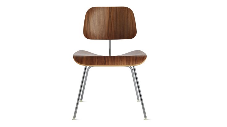 Eames Molded Plywood Dining Chair with a metal base.