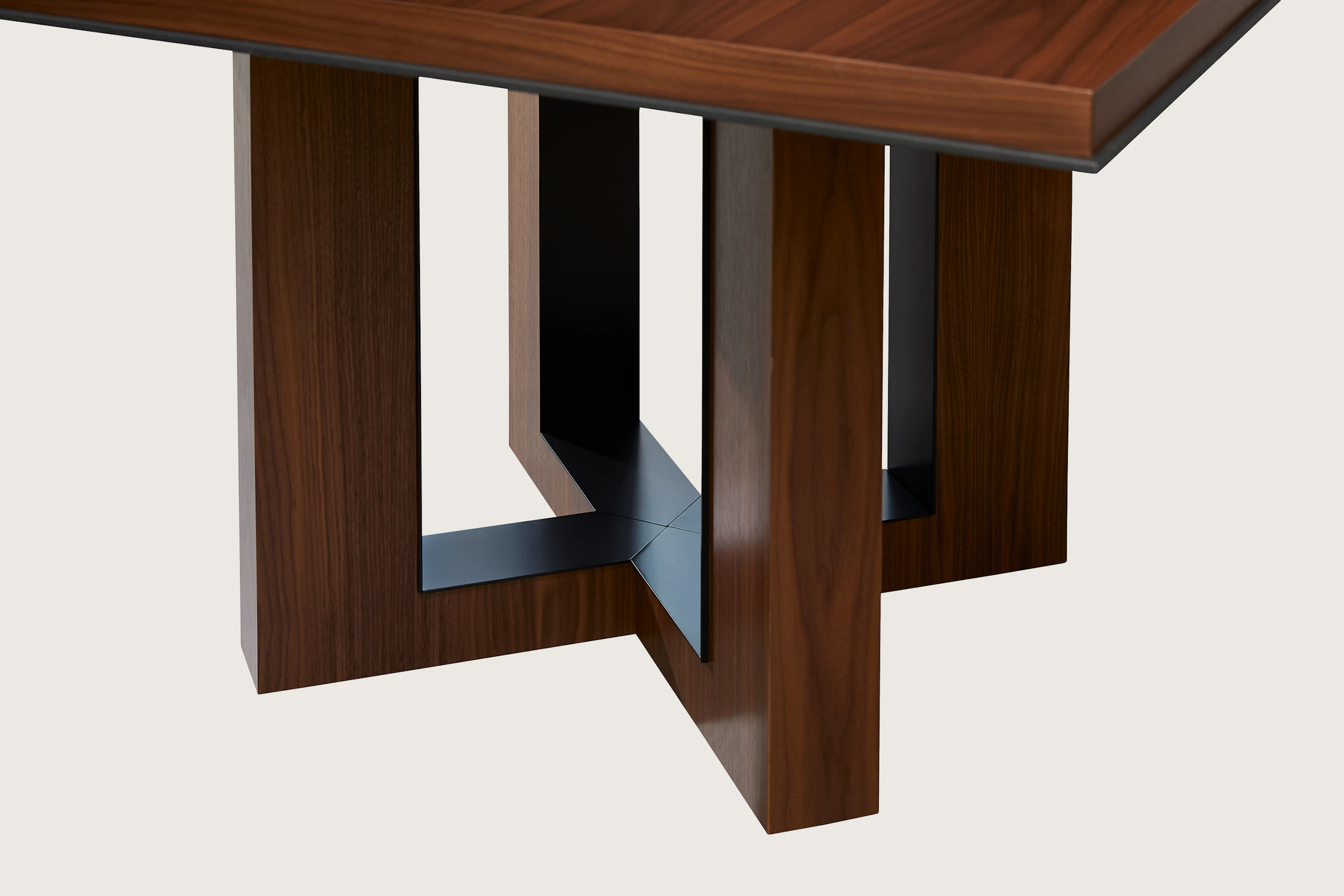 Highline 50 Meeting Table with Plain Sliced Walnut top and base, Black Metal trim, detail view.