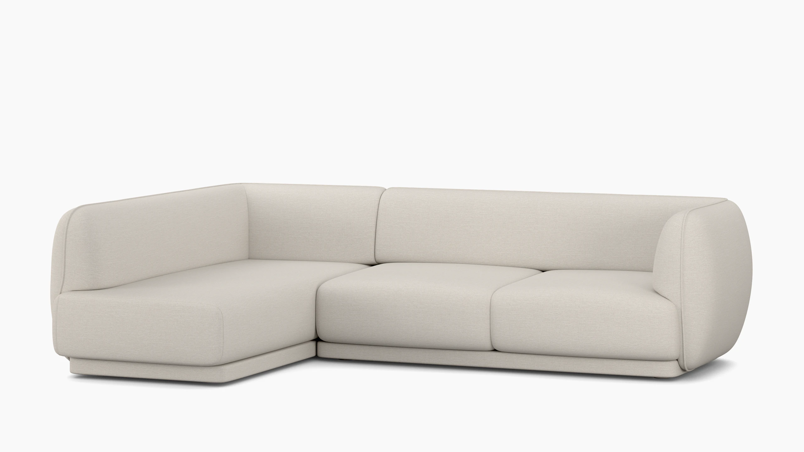 A Meris Sectional Chaise in Clavicle viewed from an angle.
