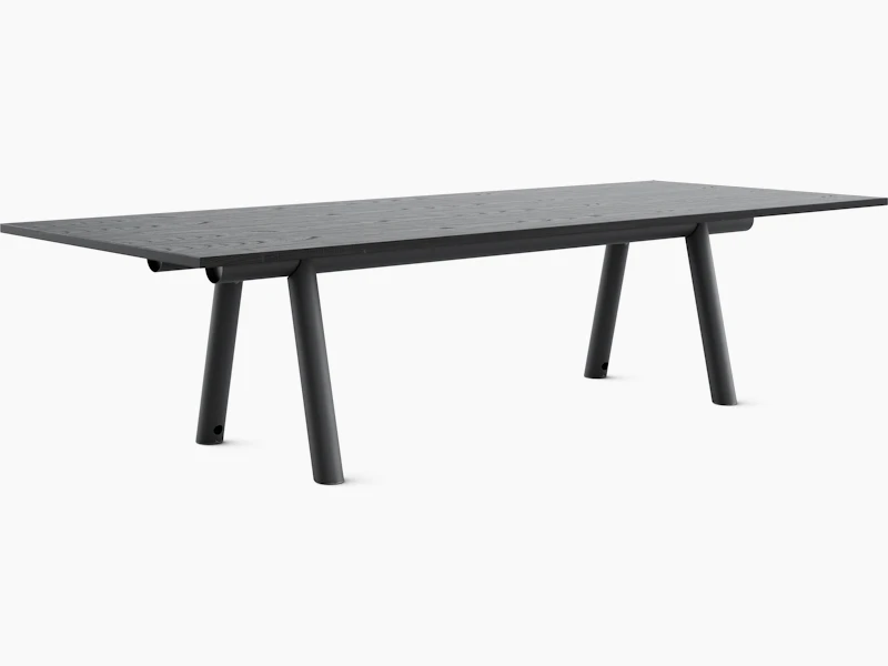HAY Boa Table with black trestle base, and ebonized oak rectangle top.