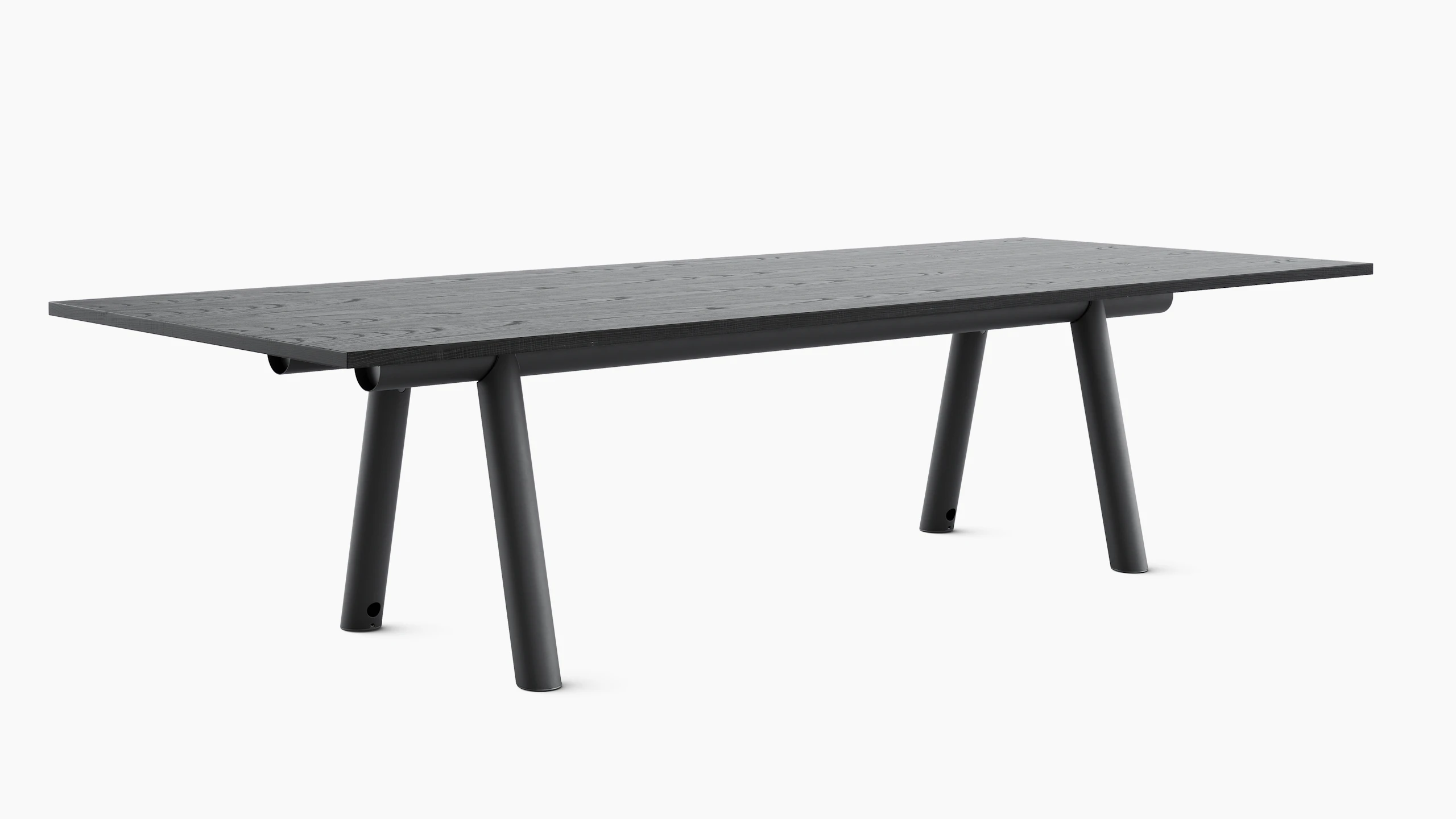 HAY Boa Table with black trestle base, and ebonized oak rectangle top.