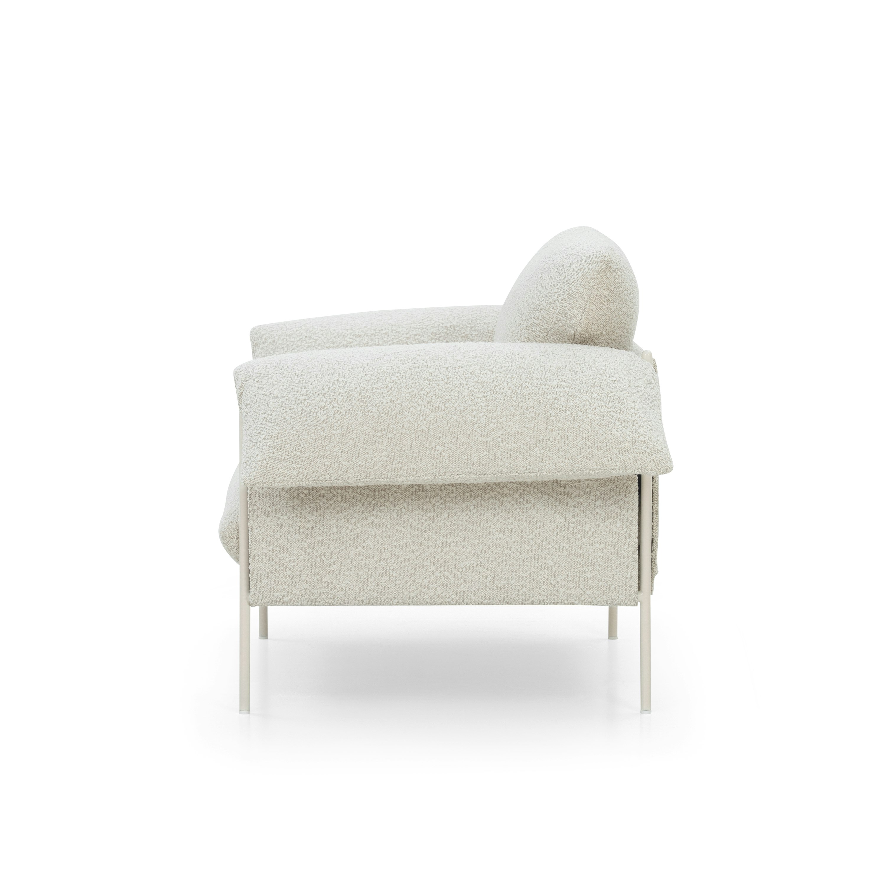 A Alva Chair in La Creme with a Nougat Cream finish viewed from the side