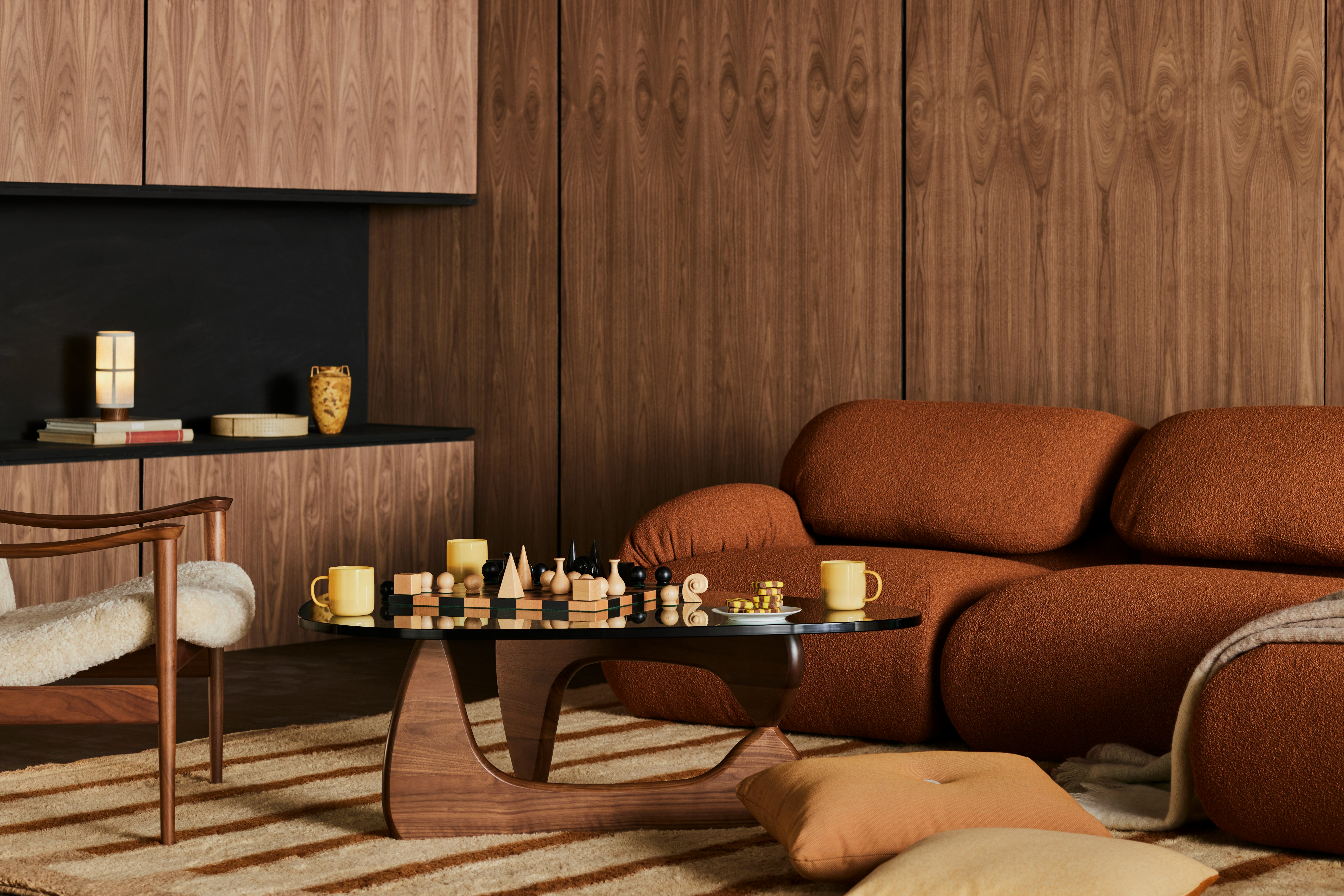 Noguchi Table in Walnut and Luva Modular Sectional in Terracotta