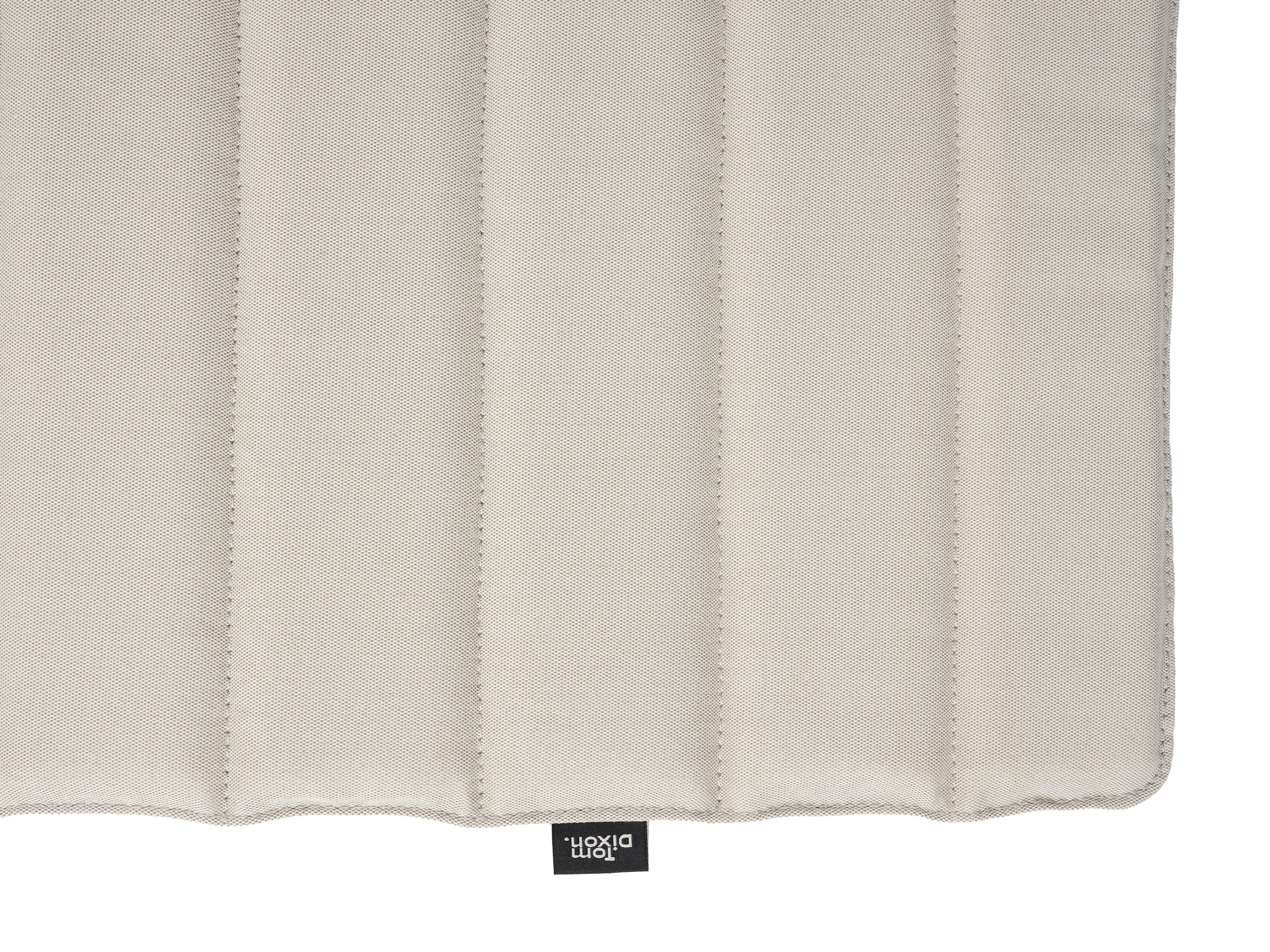 A detailed look at the Groove Outdoor Seat Cushion in Putty.