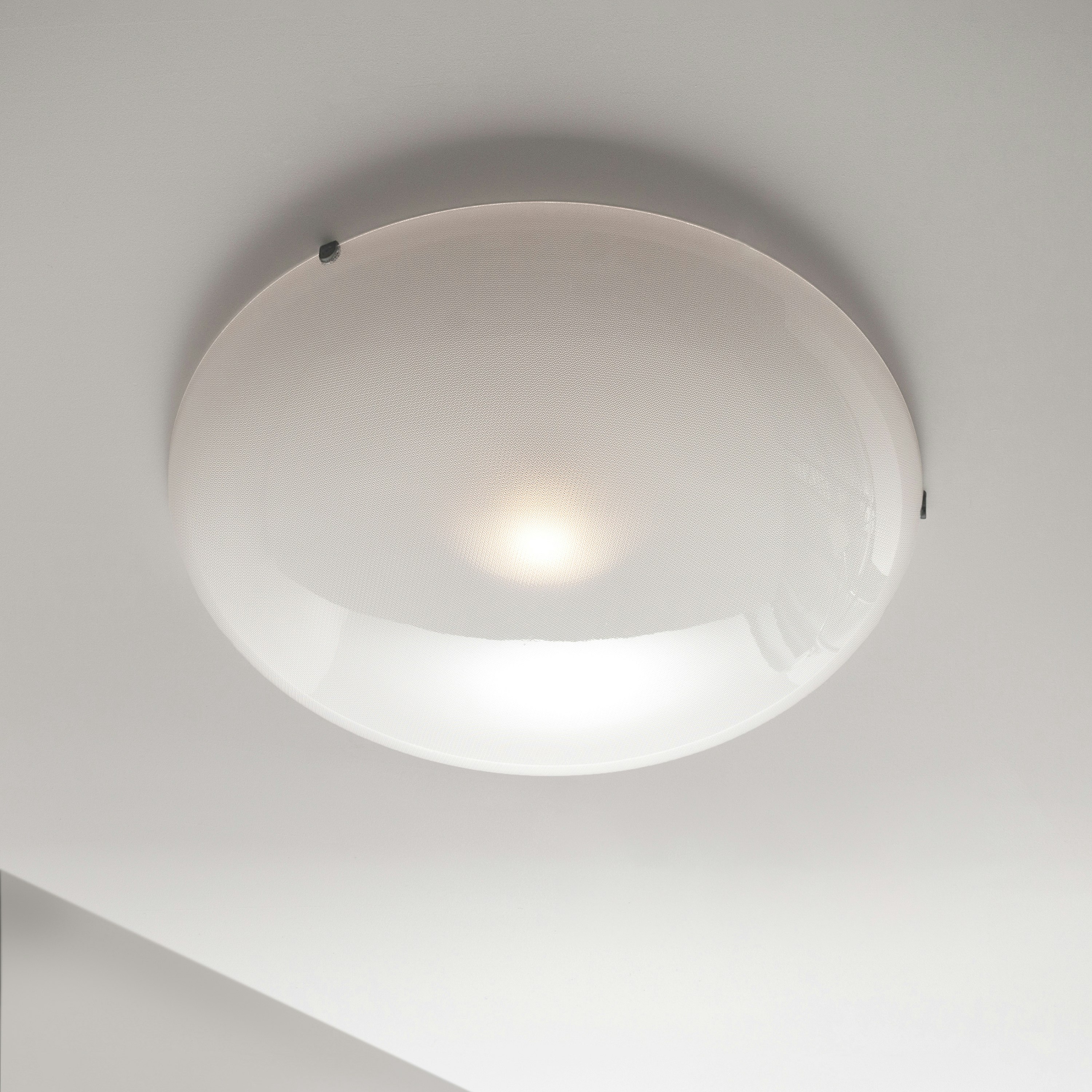 A Iris Wall / Flush Mount in Black viewed from the front.