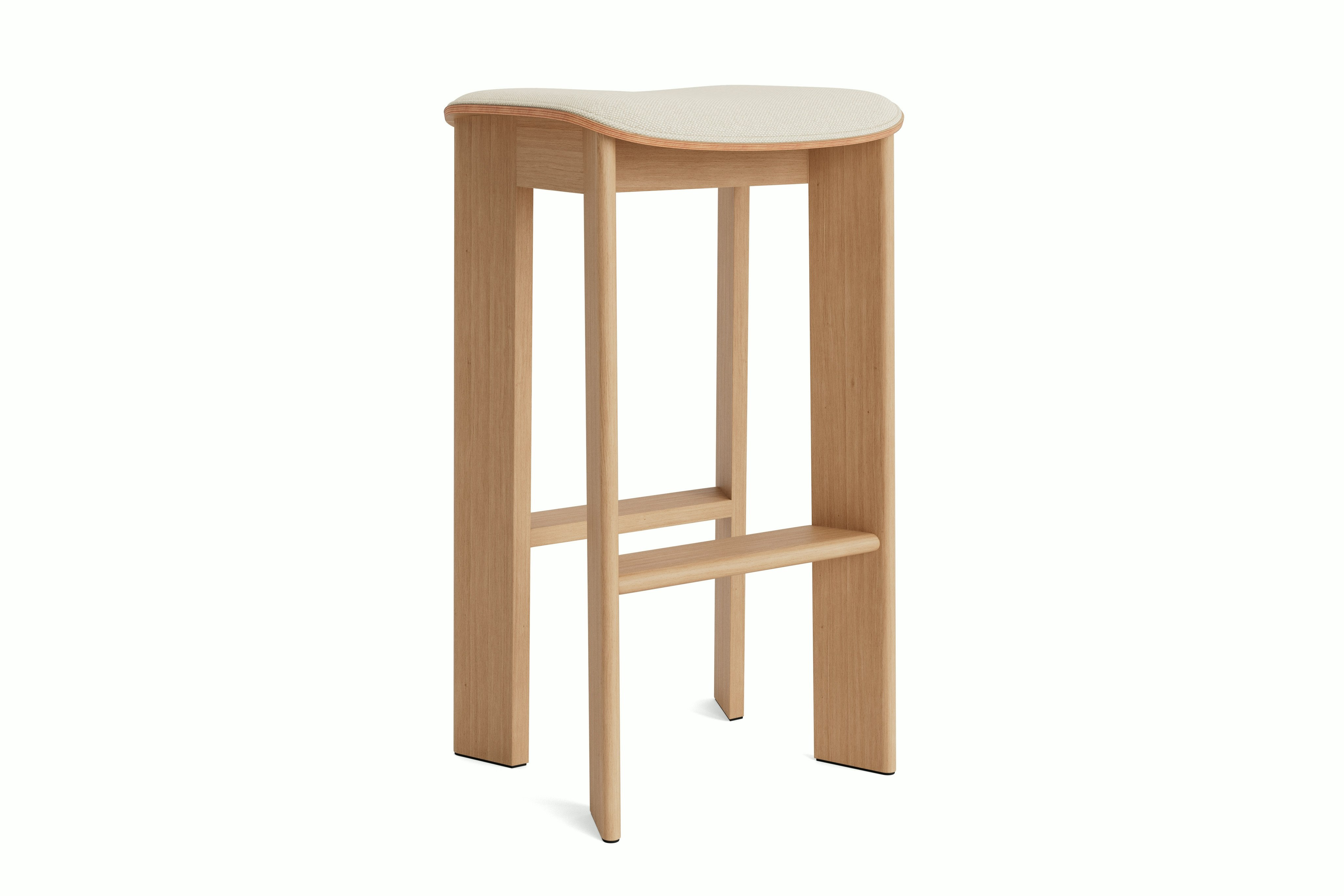 Chisel bar stool in oak with upholstery, angled view