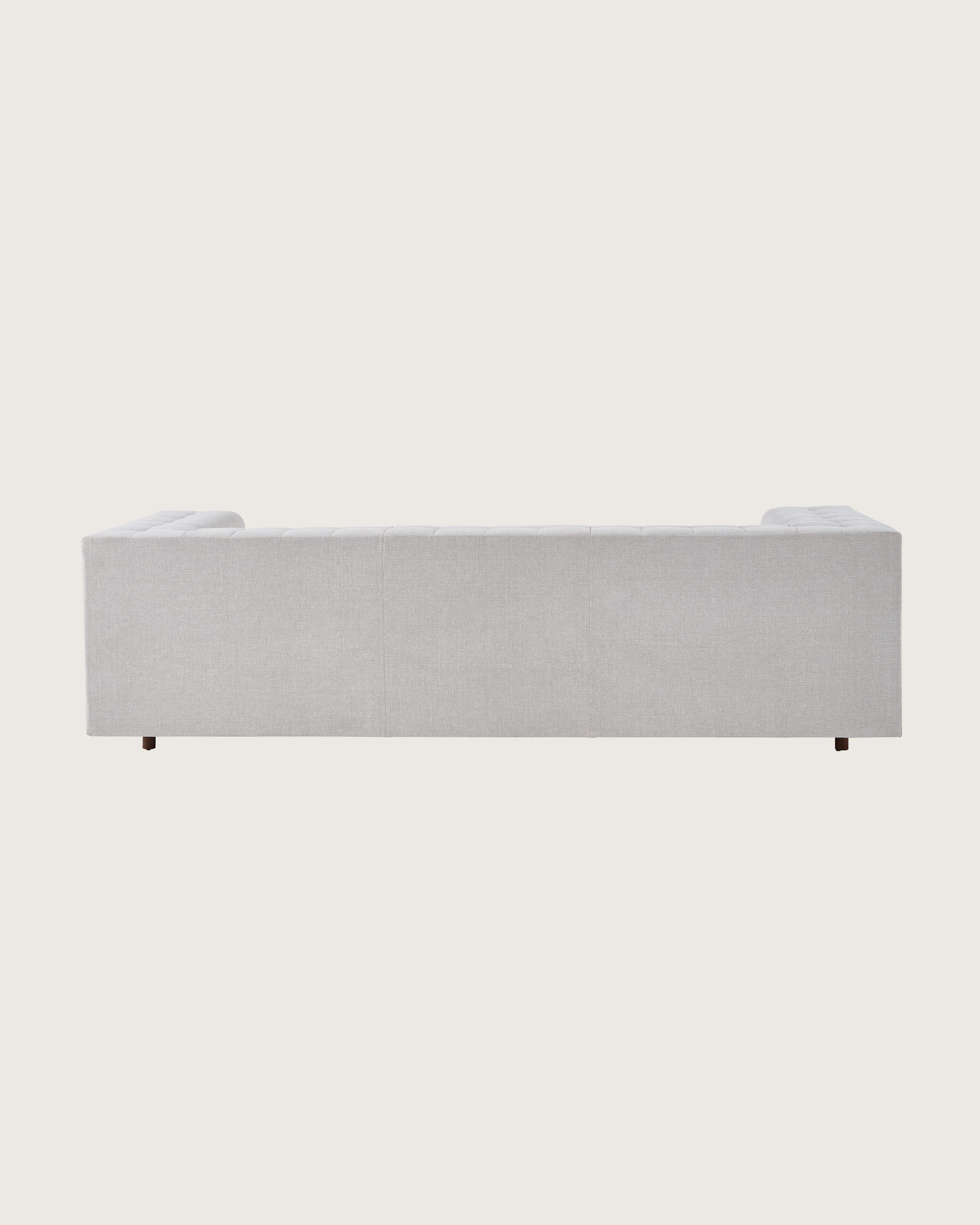 Rapport Sofa with walnut legs.