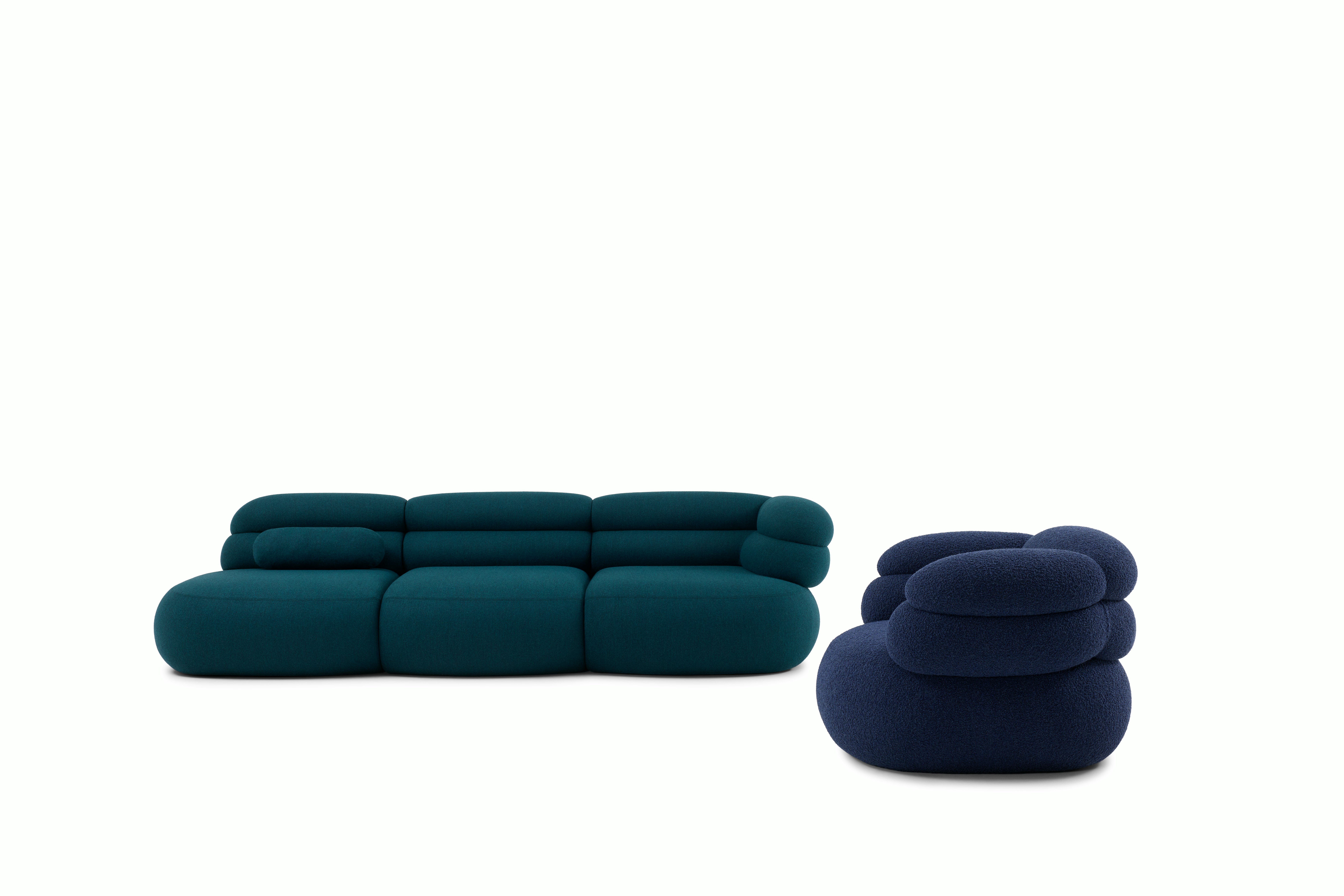 A detailed look at a Biboni Open End Sofa in Stellium Midnight Teal.