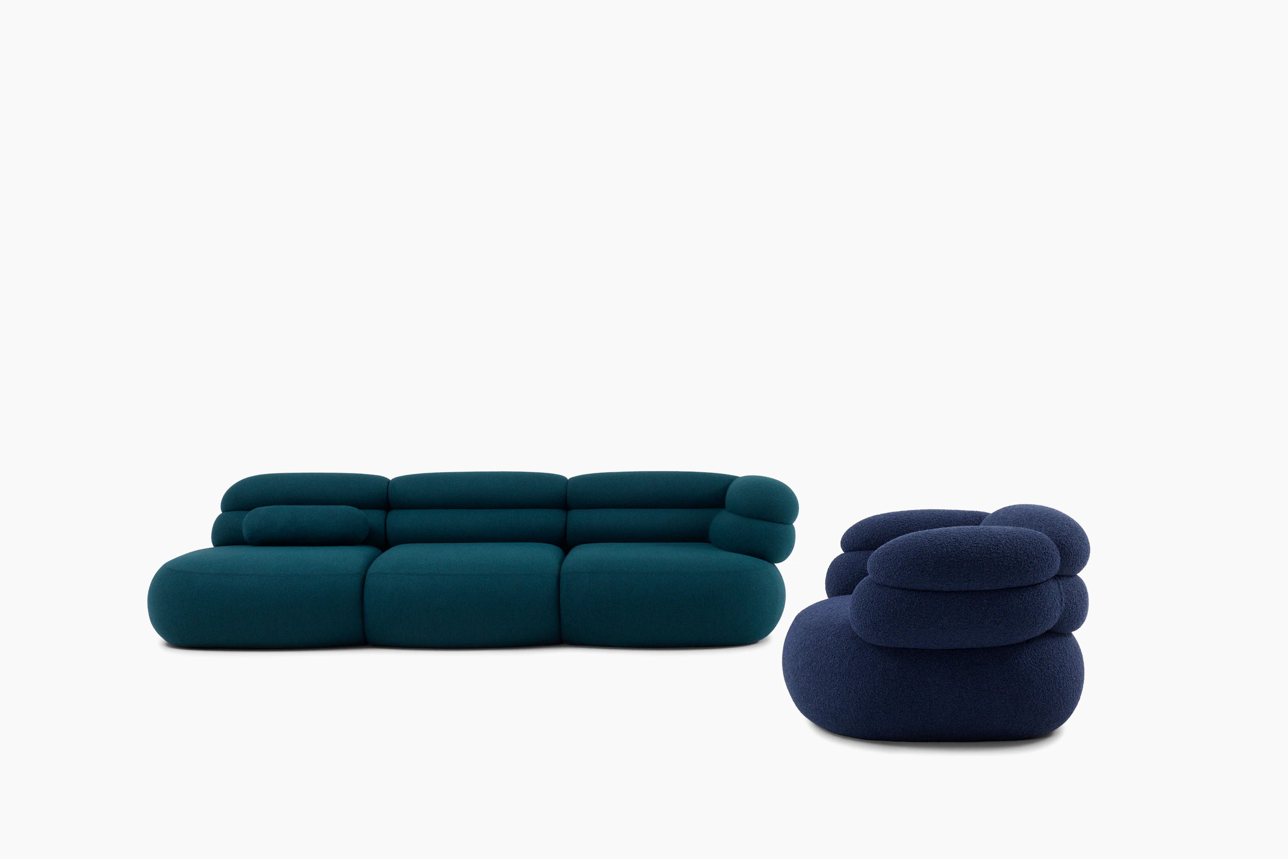 A detailed look at a Biboni Open End Sofa in Stellium Midnight Teal.