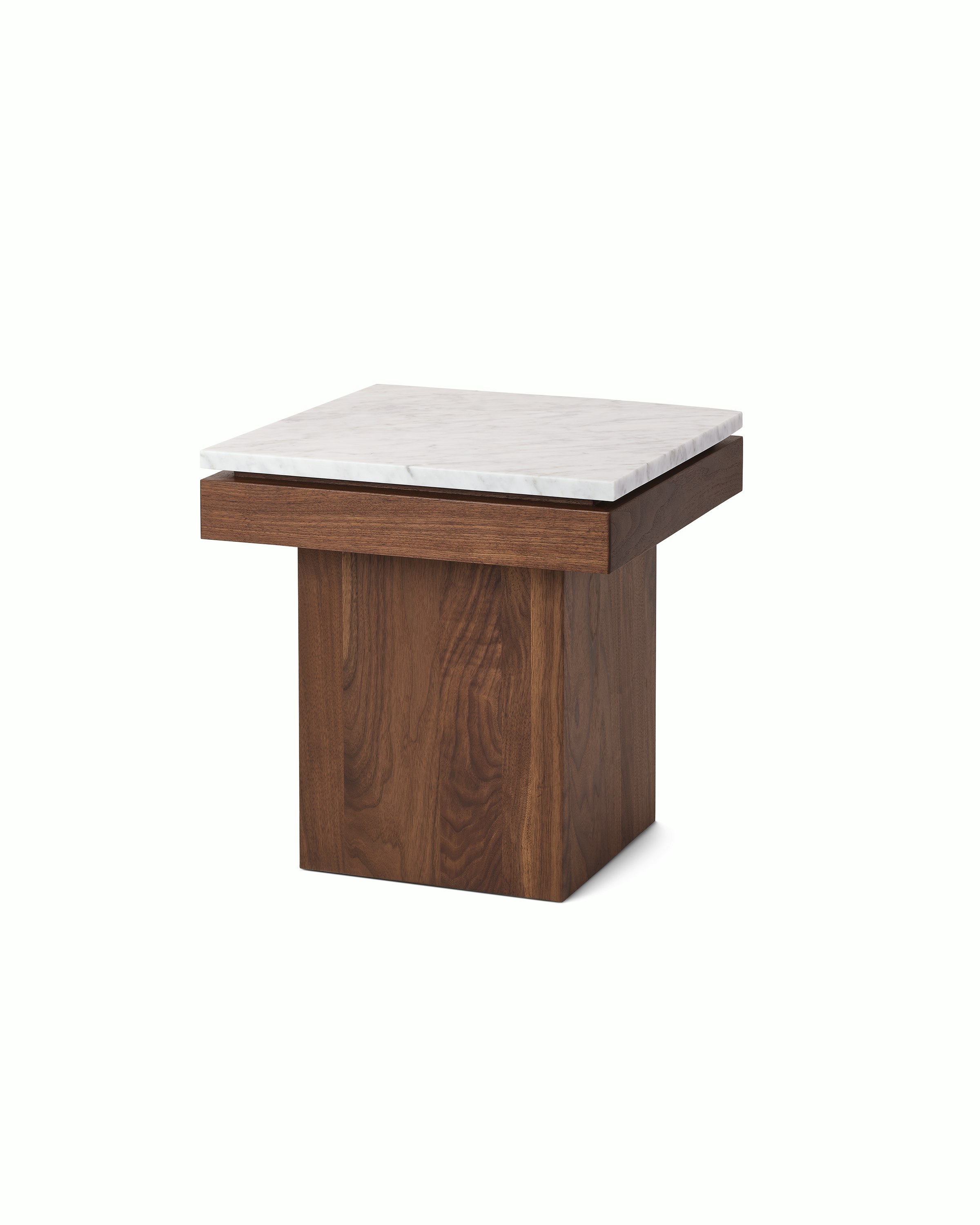 Pawson Drift Side Table with walnut base and white marble top, viewed from an angle.