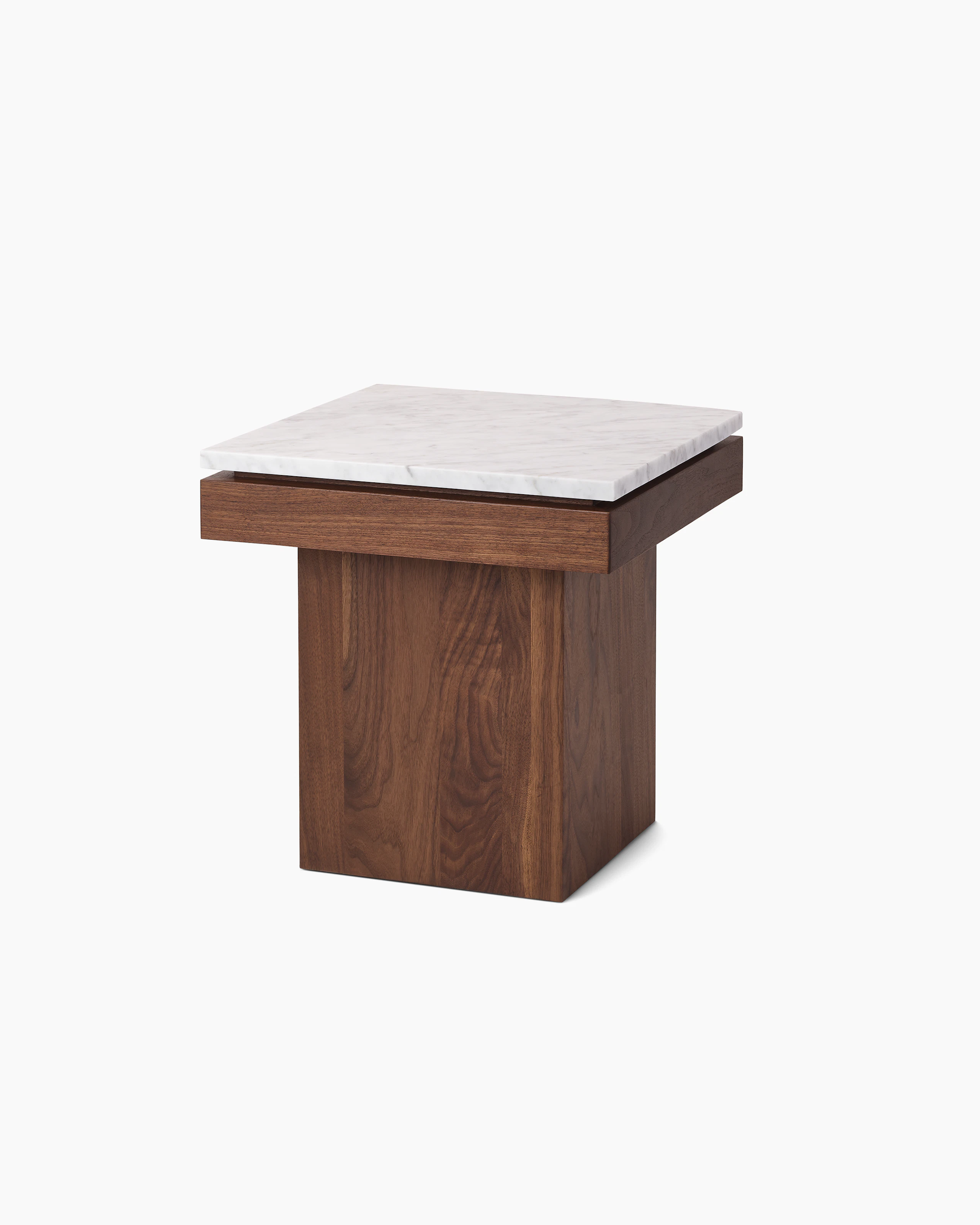 Pawson Drift Side Table with walnut base and white marble top, viewed from an angle.