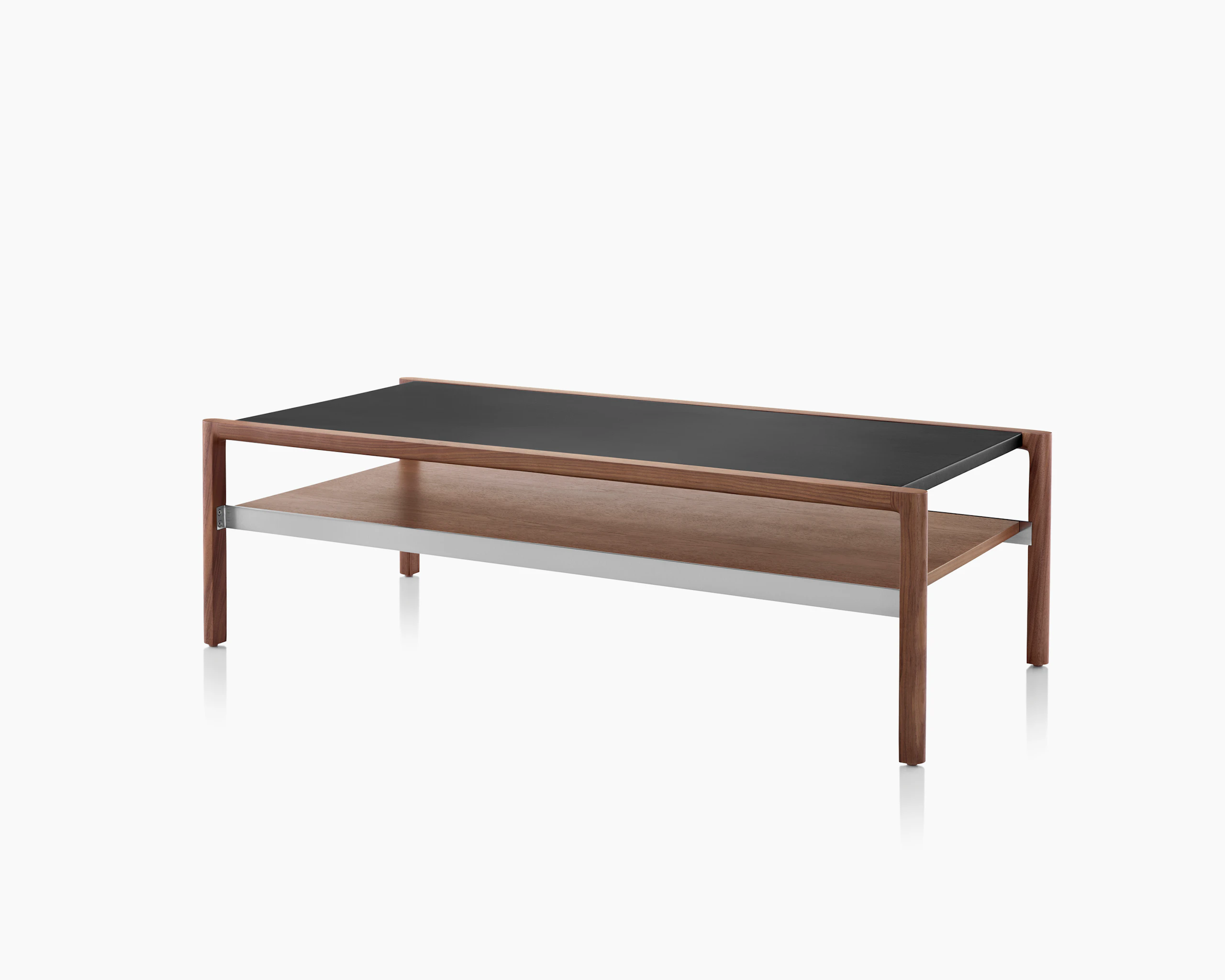 A rectangular Brabo coffee table with a black Bristol Leather-wrapped top, walnut lower shelf, and metal frame supports, viewed at an angle.