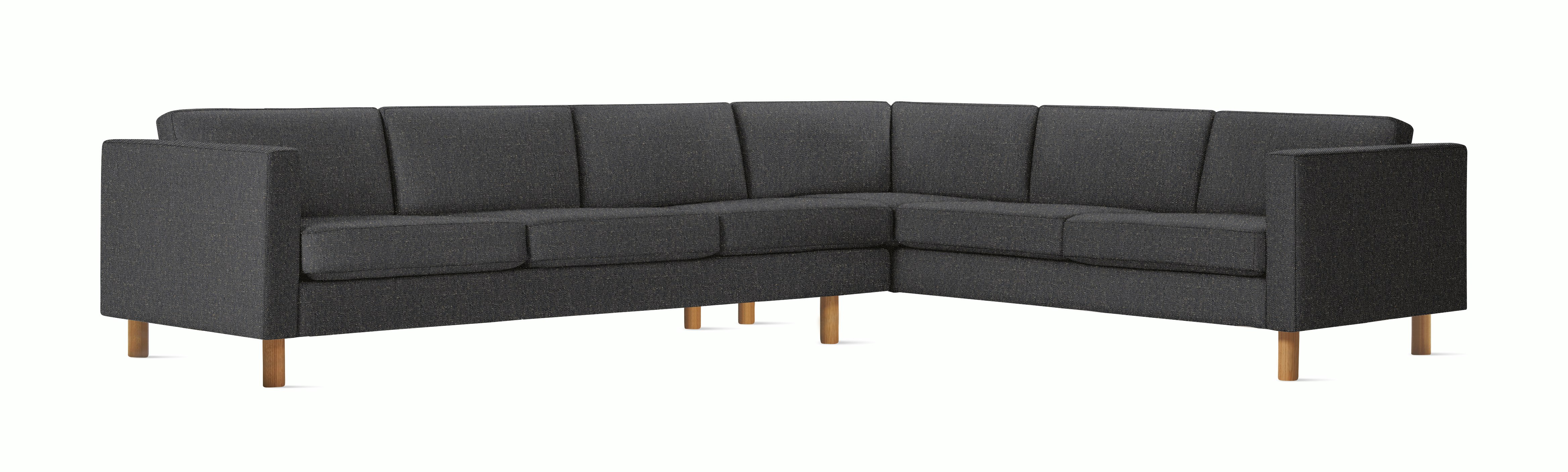 A Lispenard Corner Sectional in Millennium with Oak finish viewed from the front.