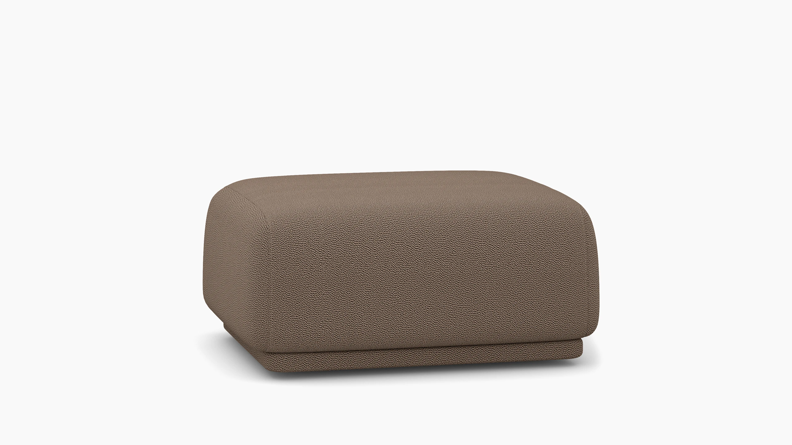 A Meris Ottoman in Brown viewed from an angle.