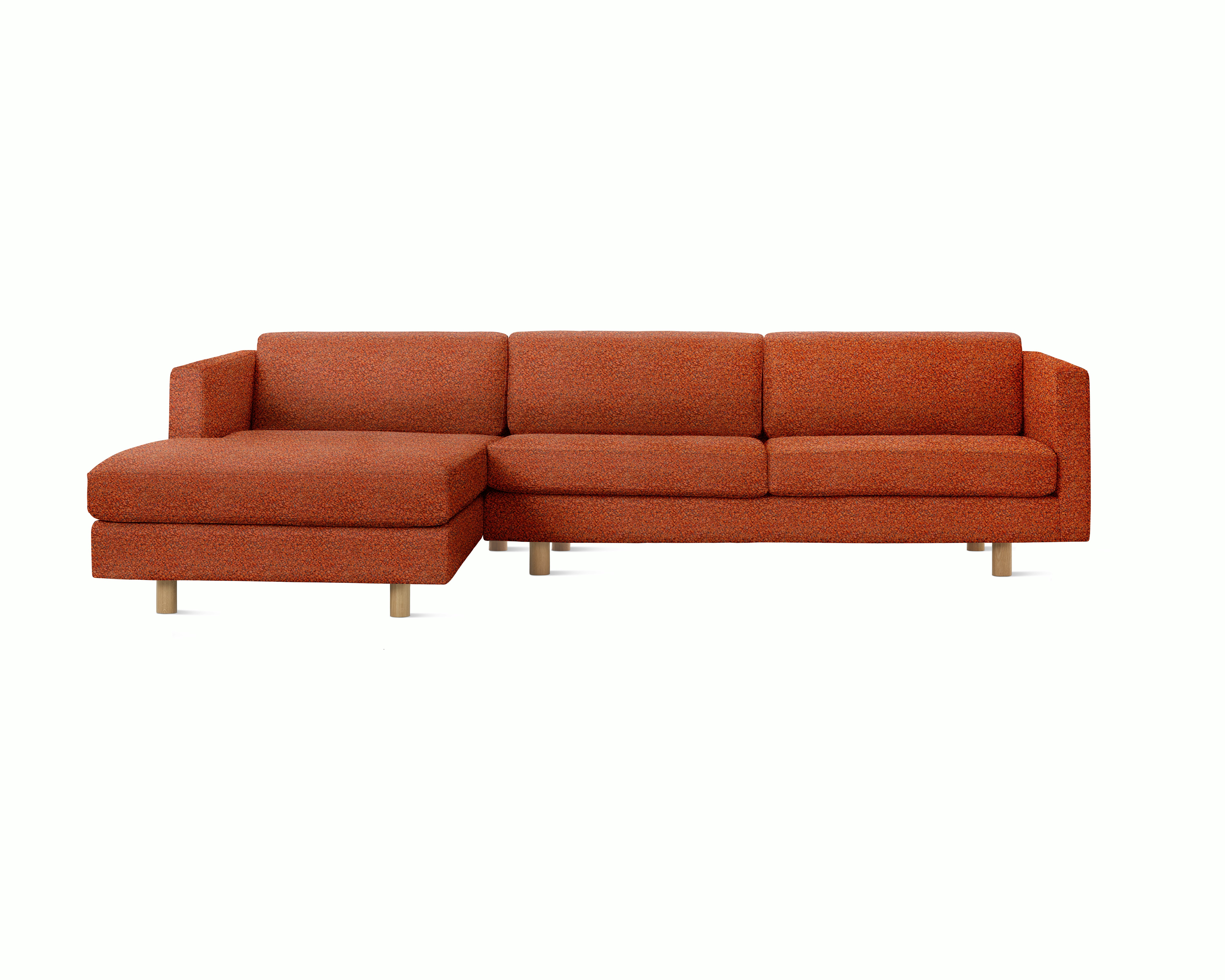 A Lispenard Chaise Sectional in Whim, Terracotta viewed from the front.