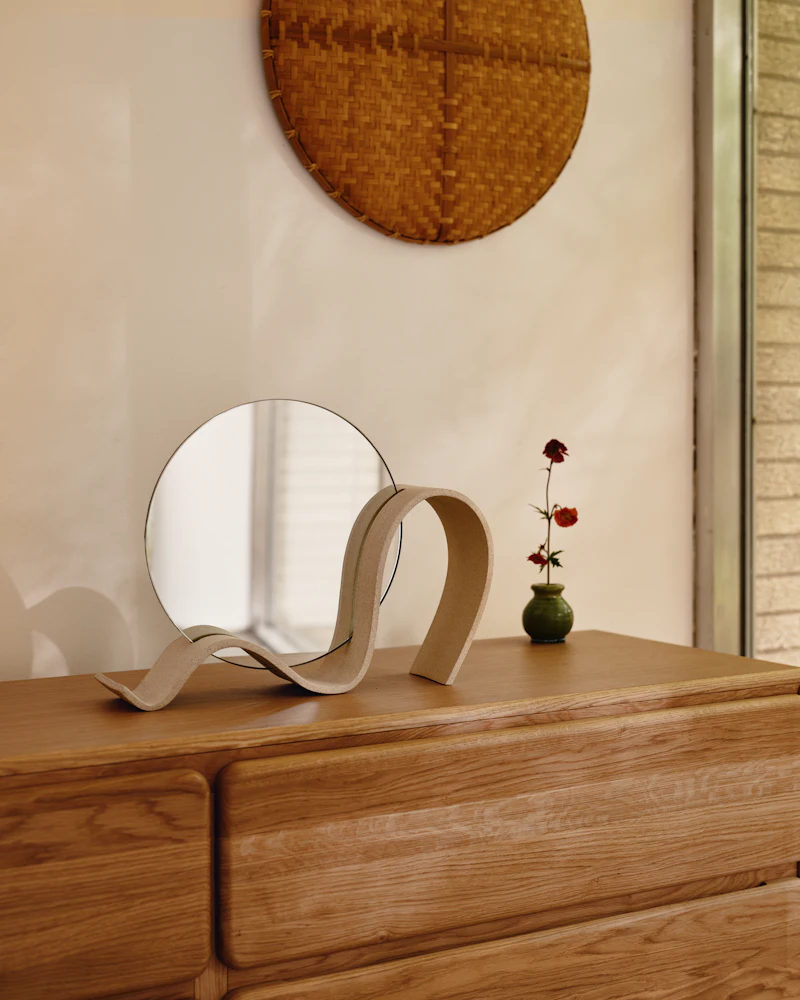 Dresser top with decorative mirror
