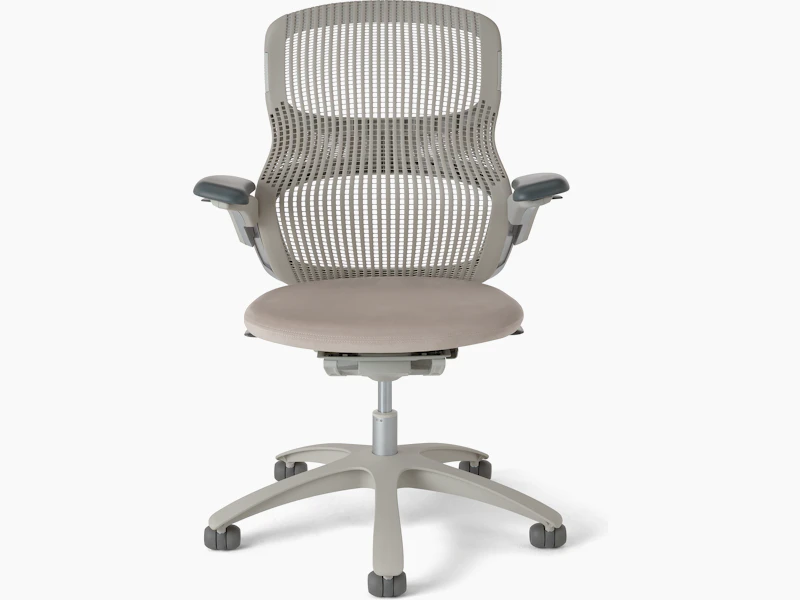 Generation Chair with high performance arms with a light finish, desert back (or tan), plastic base, standard cylinder, no lumbar, and hard casters. The ultra seat foam is upholstered with the Ultrasuede textile in the color Pebble (light tan). White background.