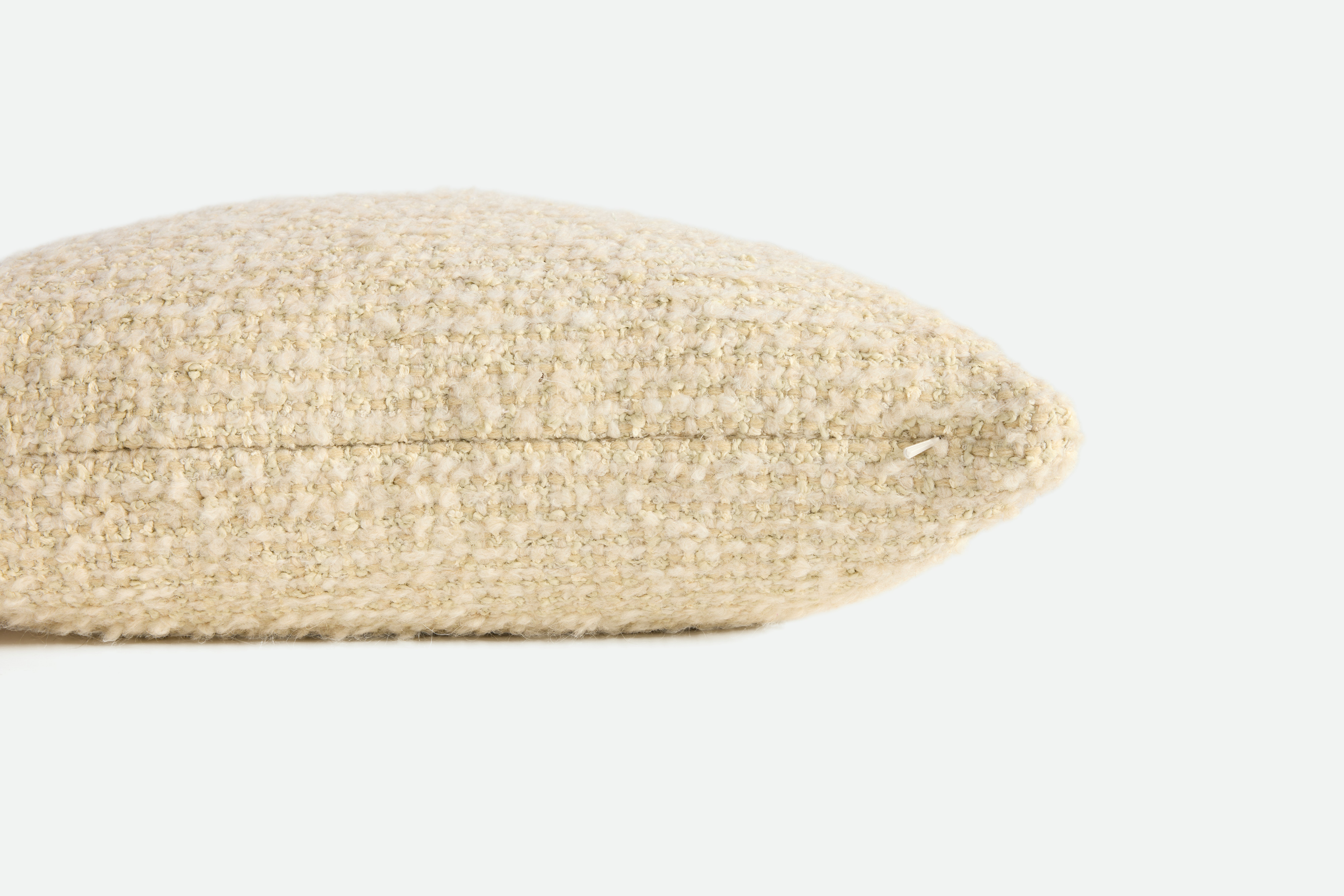 A detailed look at a Holly Hunt Cardigan Pillow in Buff.