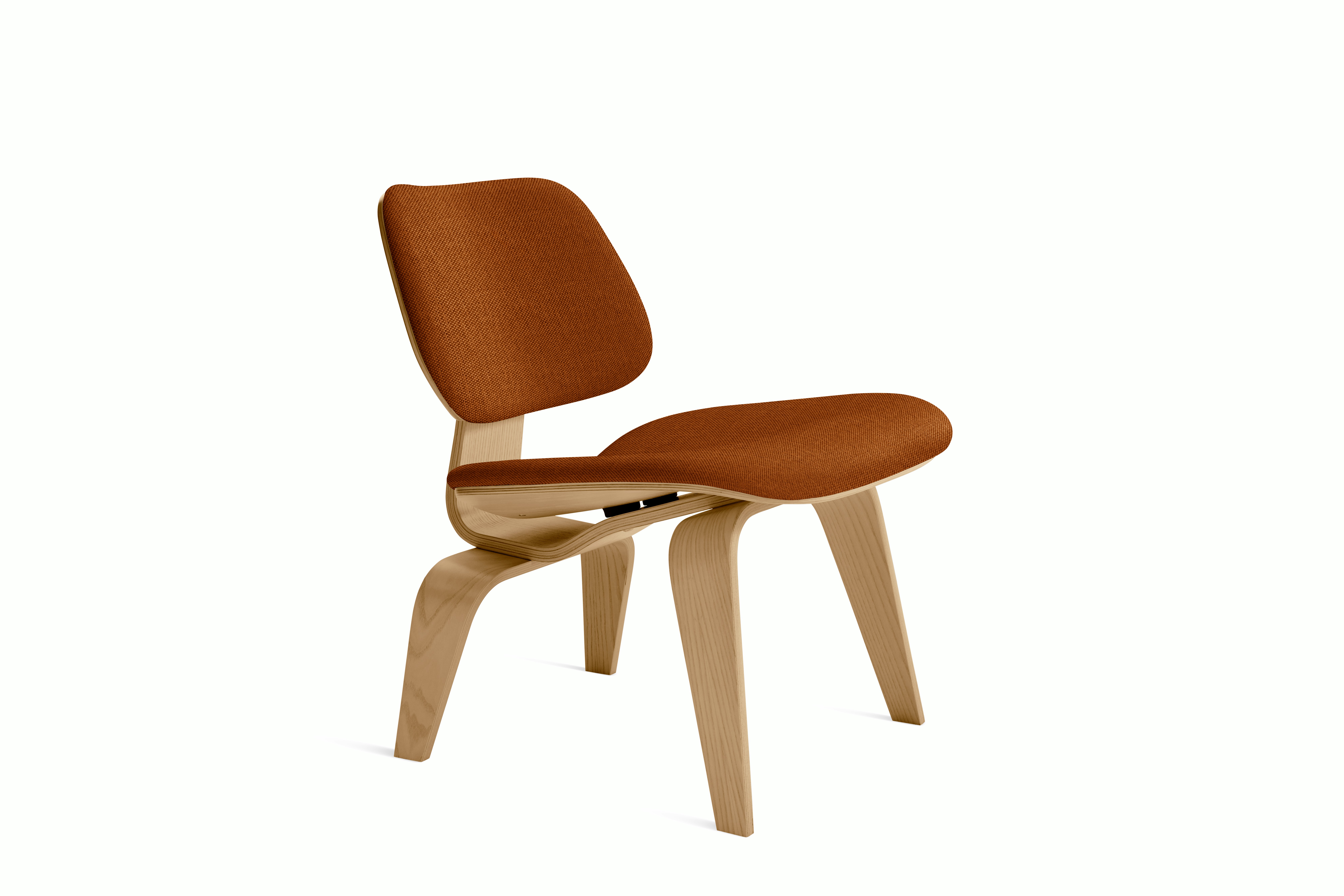A Eames Molded Plywood Lounge Chair Wood Base (LCW) in oak rust viewed from an angle.