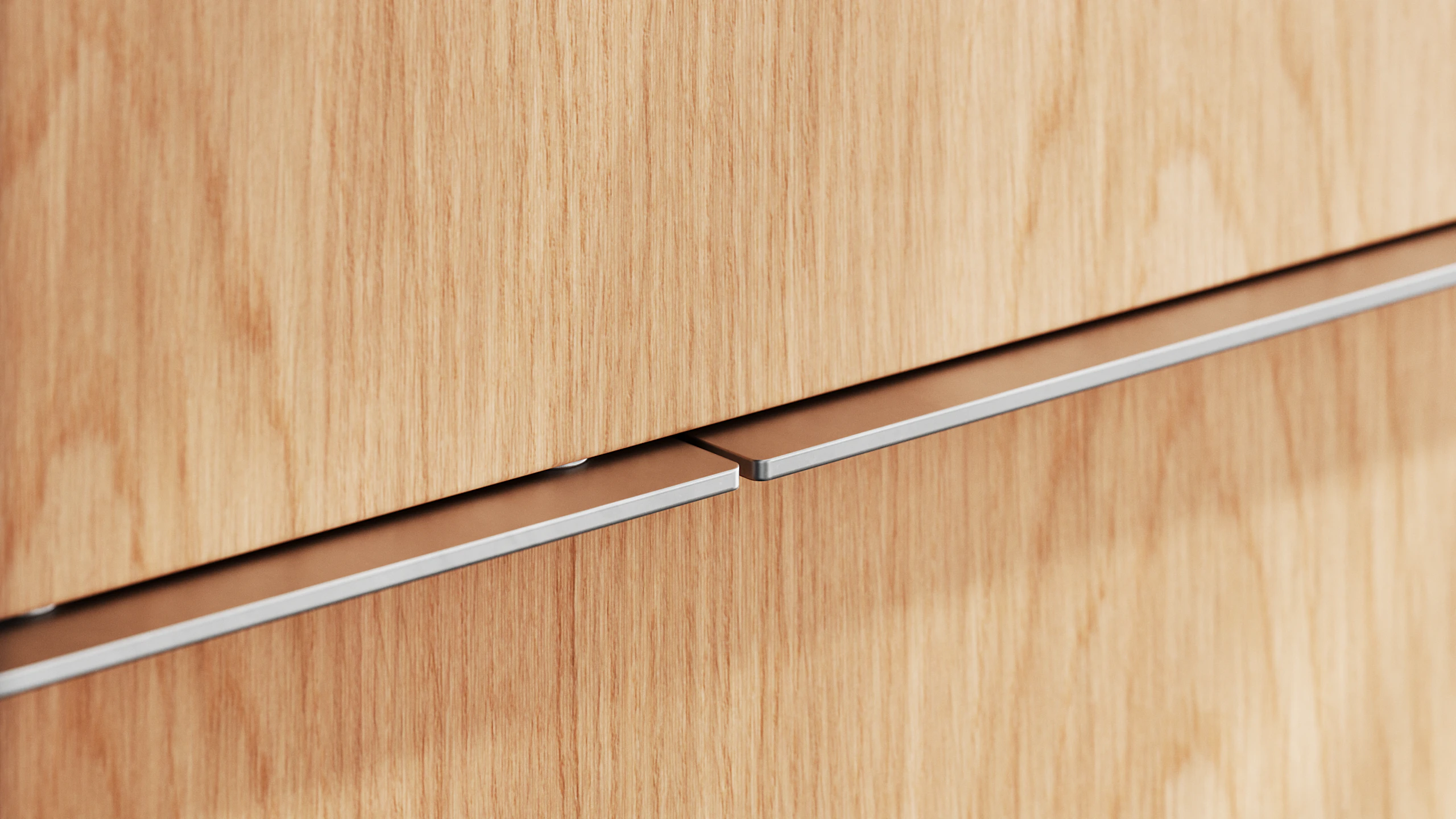Detail shot of Ascent Credenza designed by EOOS in Natural Flat Cut Oak showing the credenza pulls.