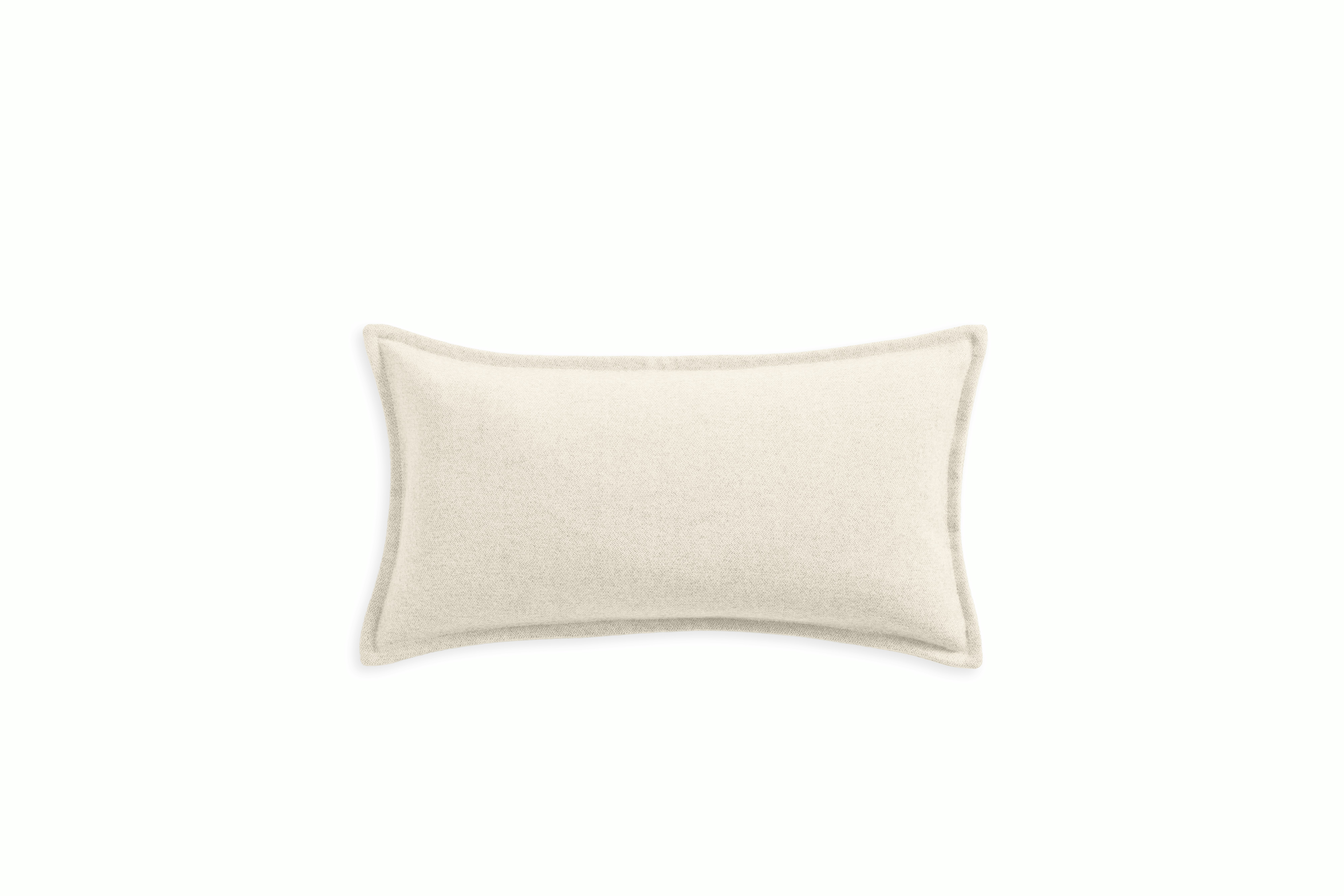 A Pecora Wool Flange Pillow in Cream viewed from the front.