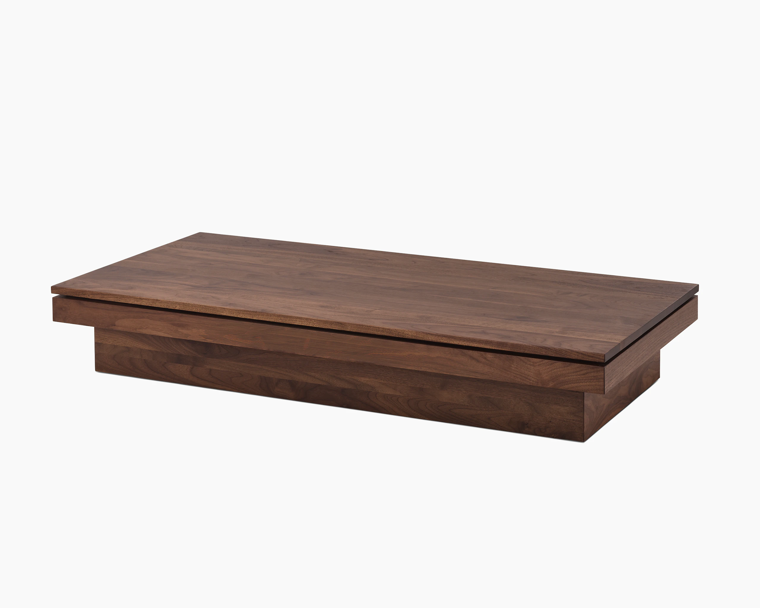 Pawson Drift Coffee Table with walnut base and top, viewed from an angle.