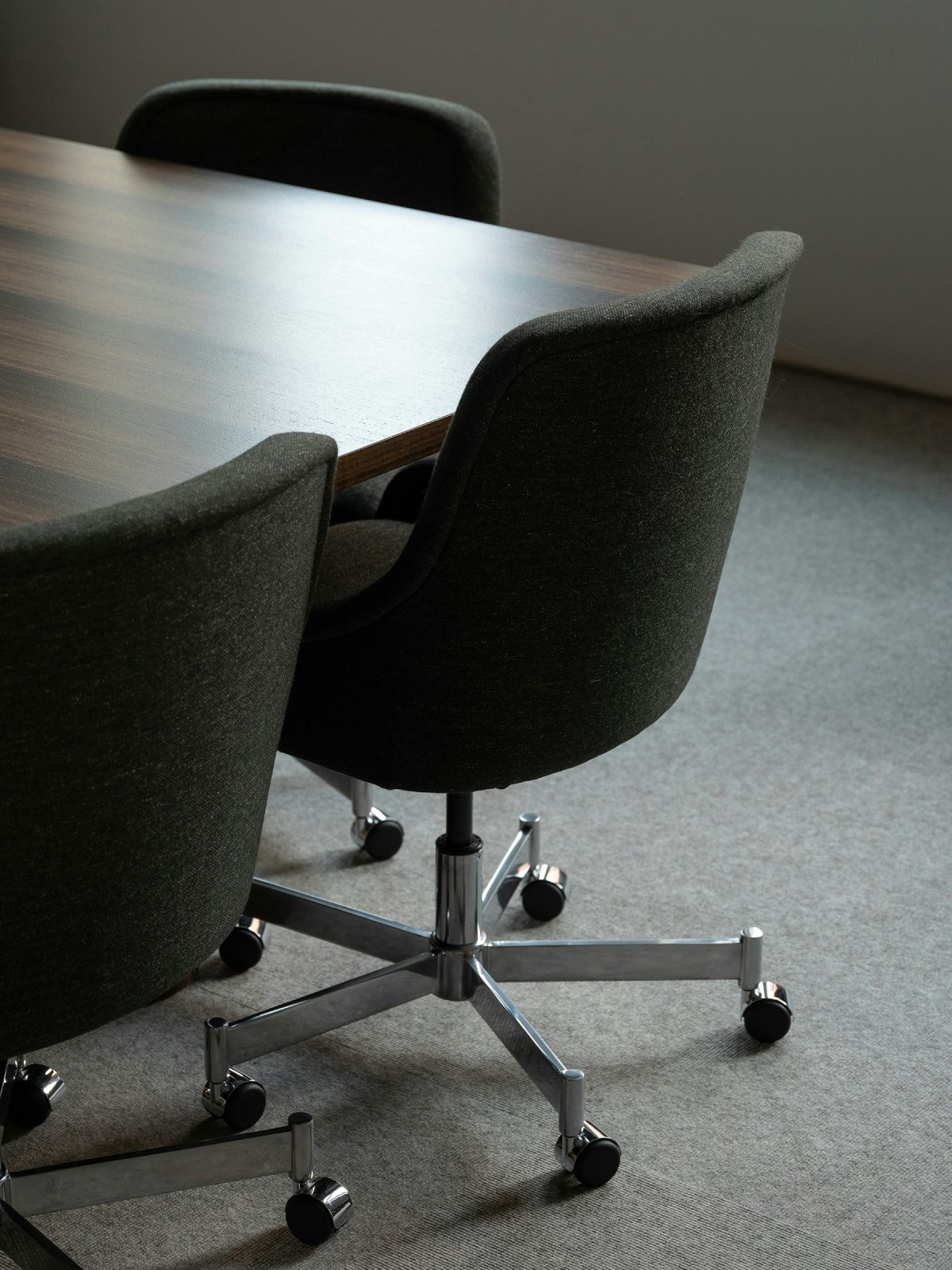 Bumper Conference Chairs in black-green textile around a JD Conference Table.