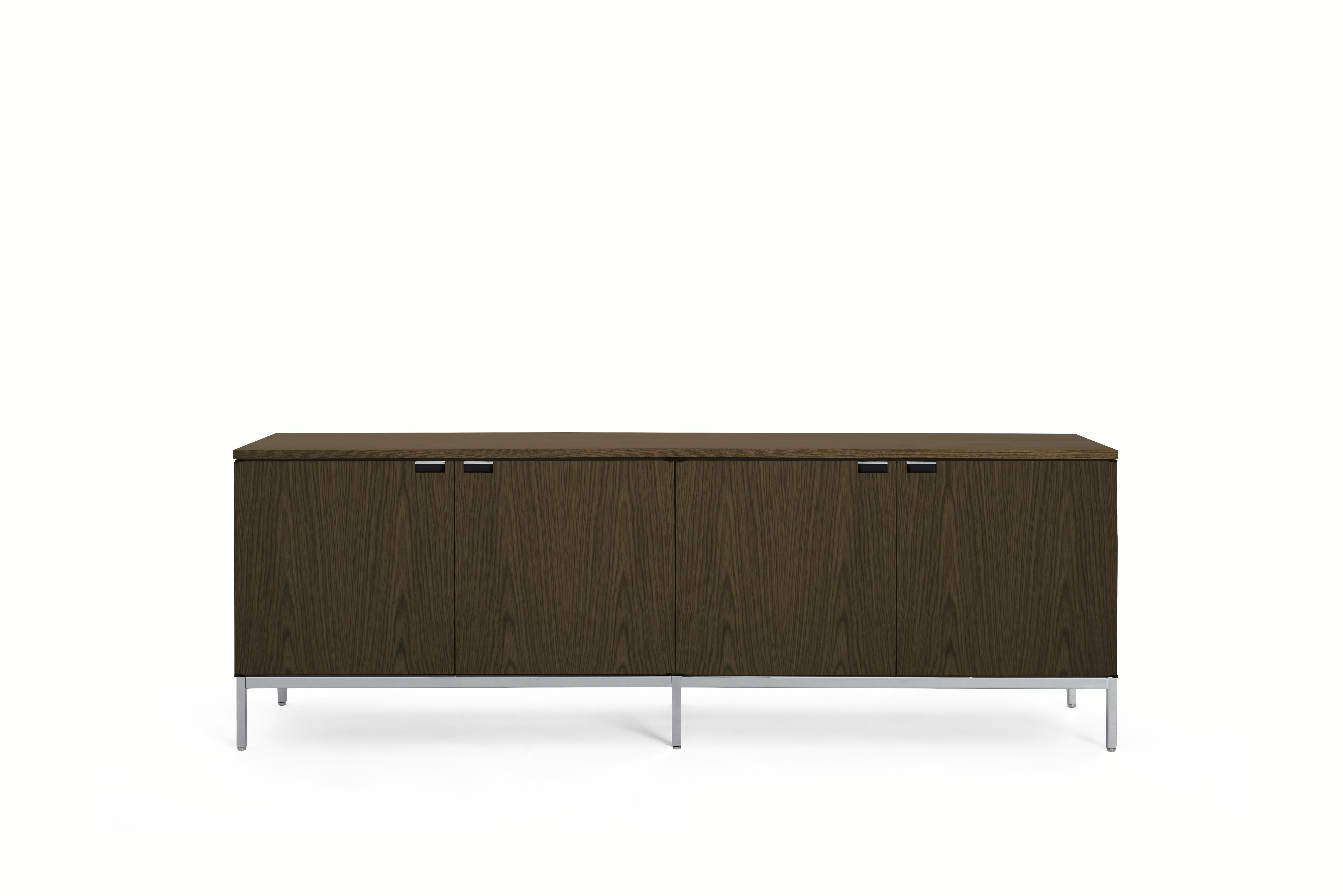 A Florence Knoll Credenza in Large, Four Cabinet, Umber on Oak, Veneer, Umber on Oak viewed from the front.