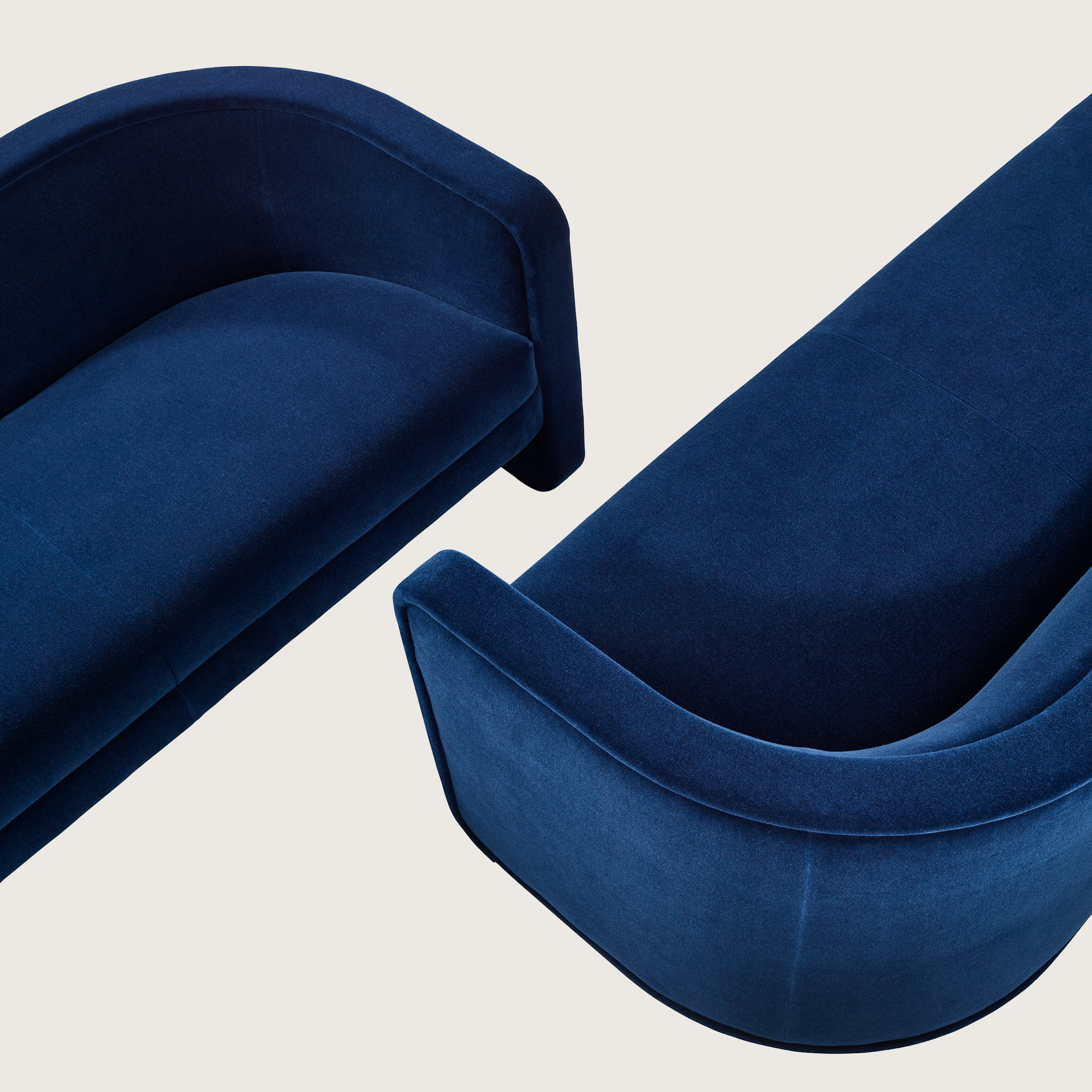 Pair of U-Series Settees upholstered in Maharam Mohair Supreme League.