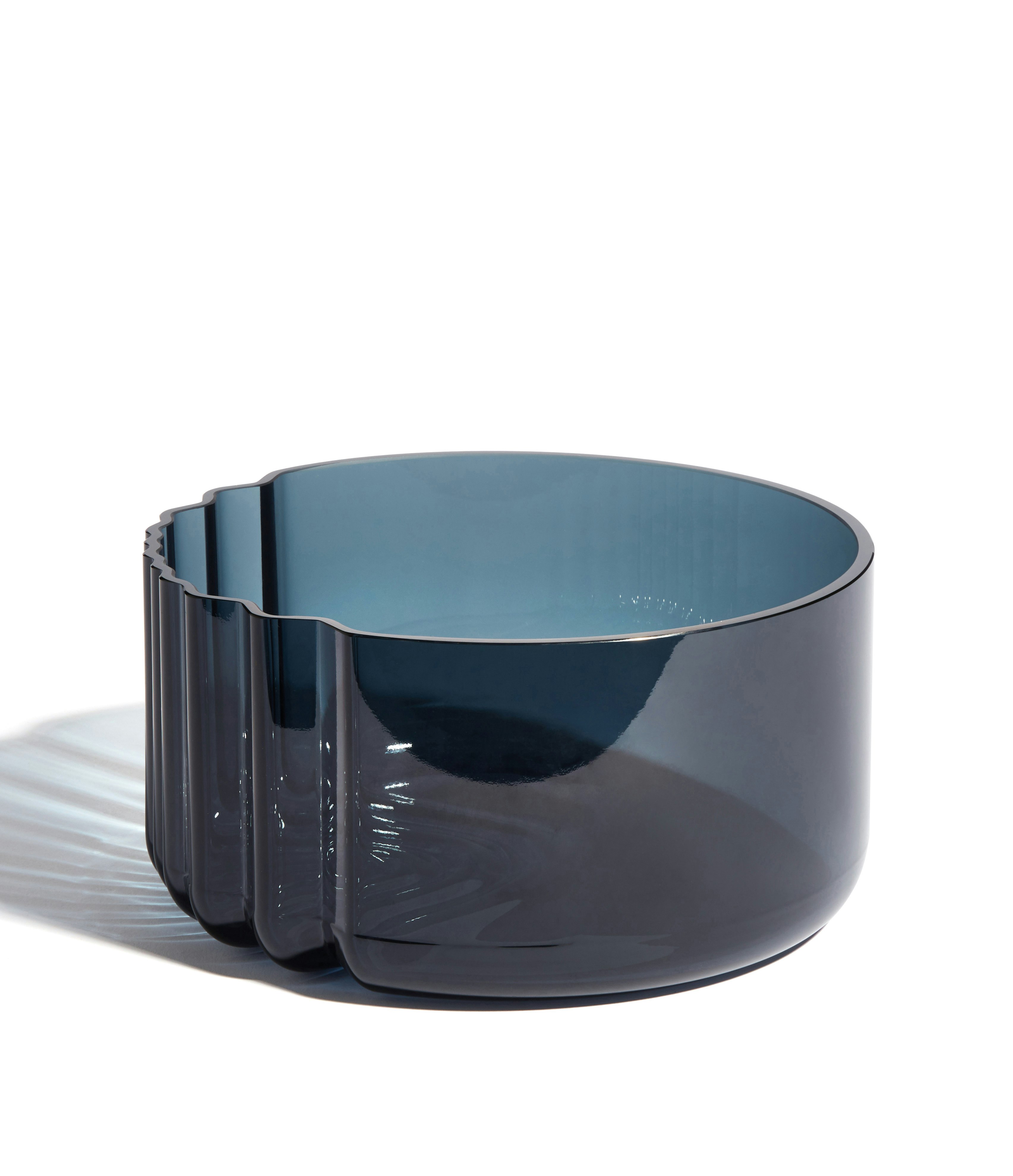 A Pulse Bowl in Dark Blue viewed from an angle.