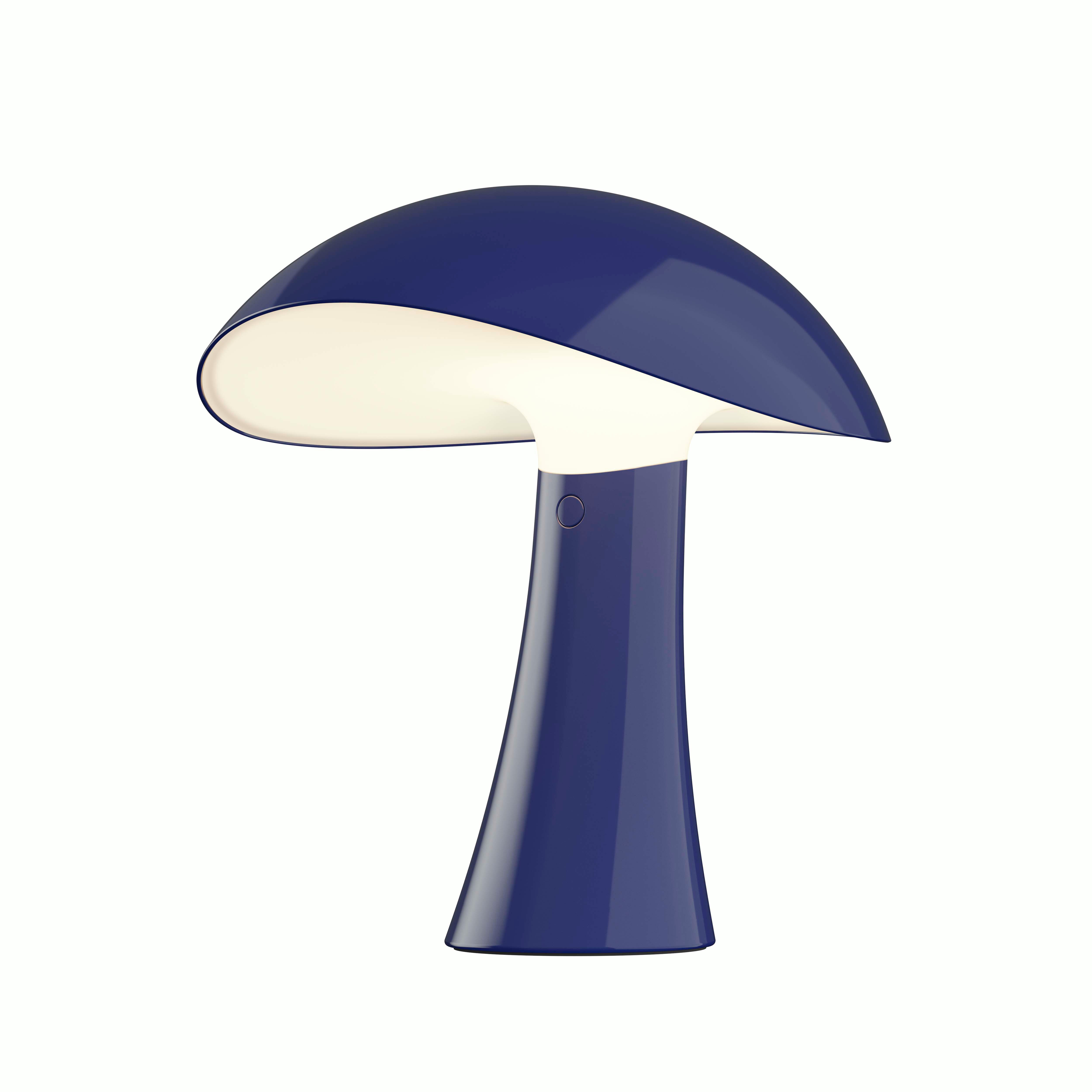 A Rumee 220 Portable Lamp in Night Blue viewed from an angle.