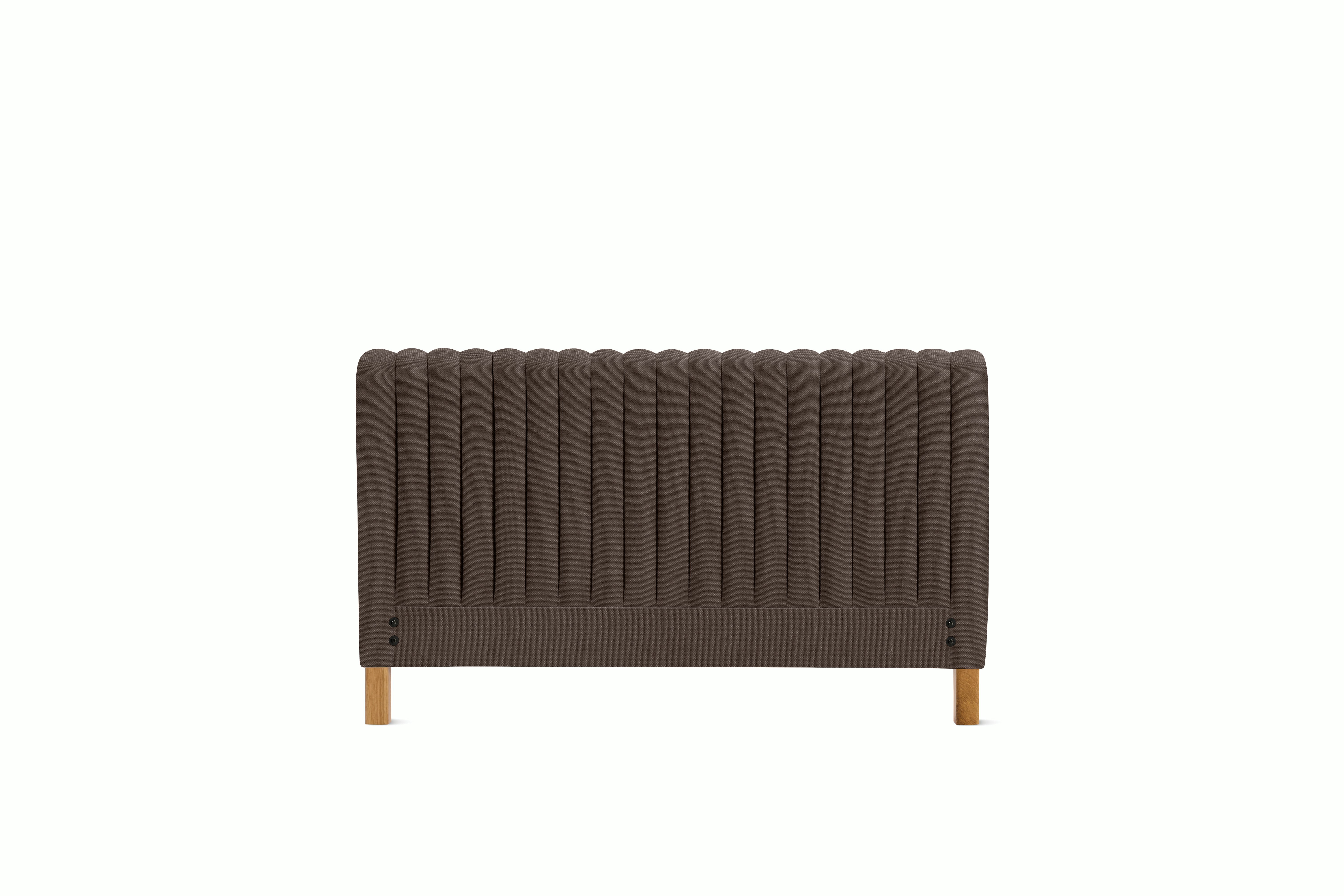 A Charlotte Headboard in Hollow viewed from an angle.