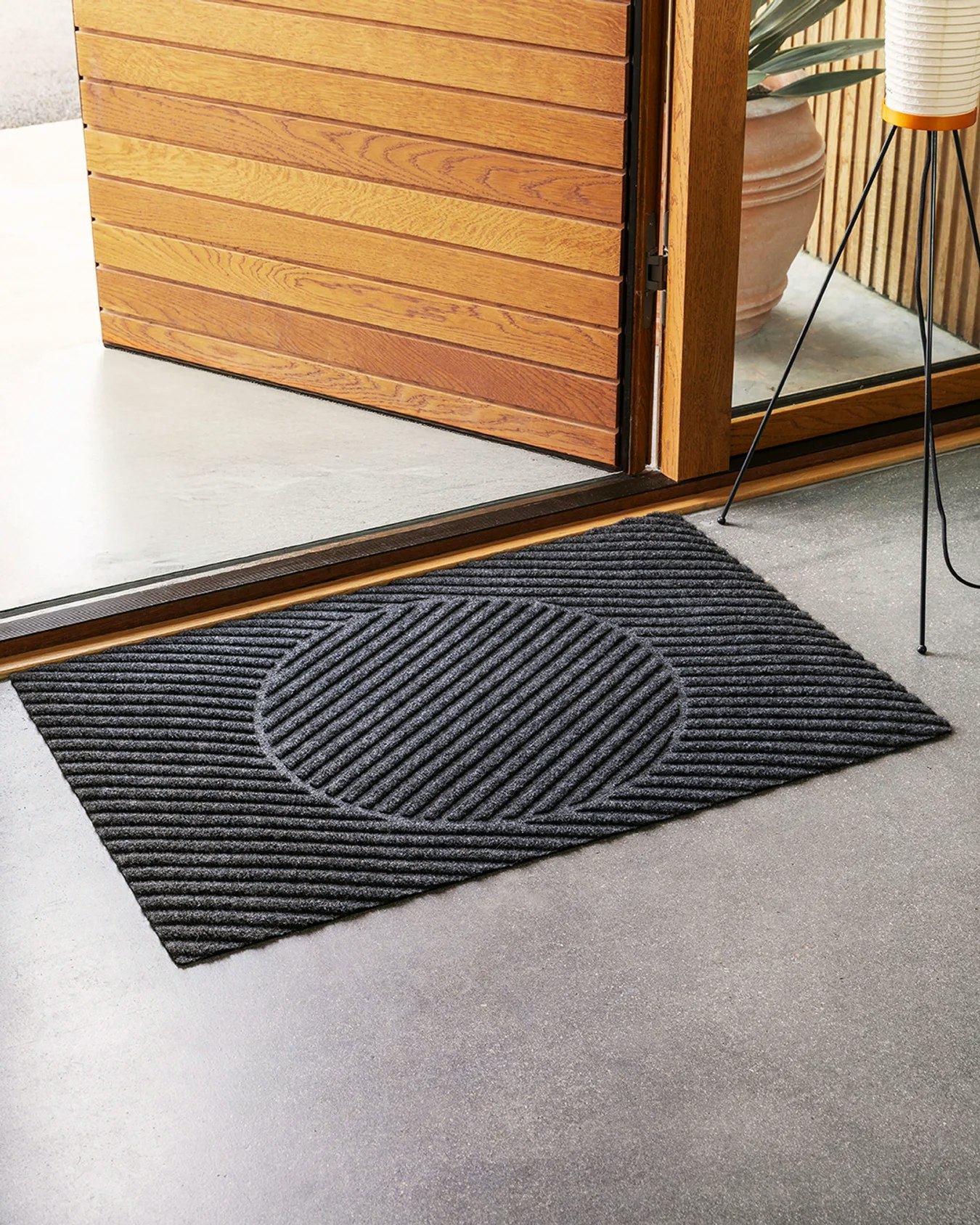 An environmental shot of a Mane Mat - 24 Inch x 35 Inch.