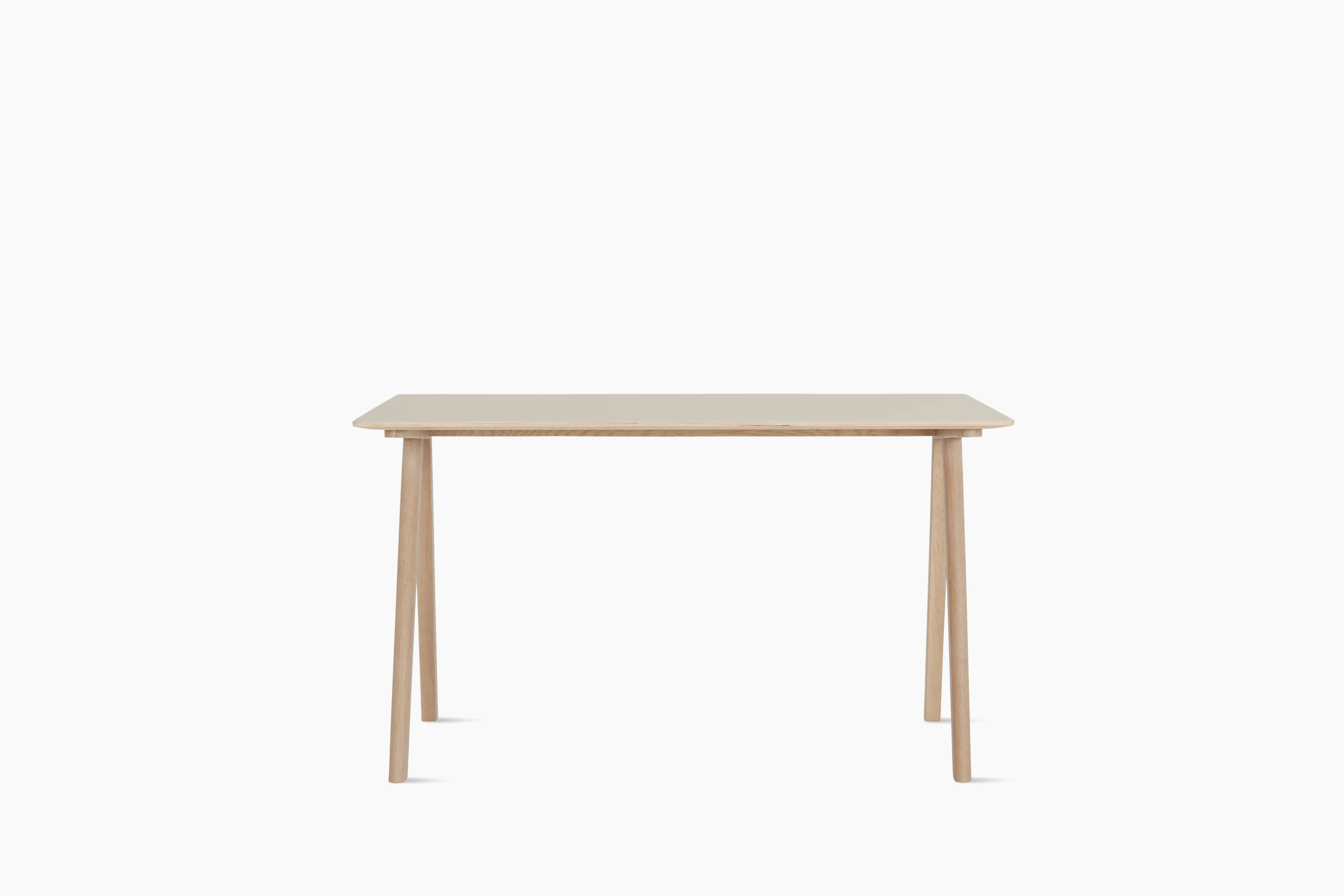 An off white Copenhague 90 Desk viewed from the front
