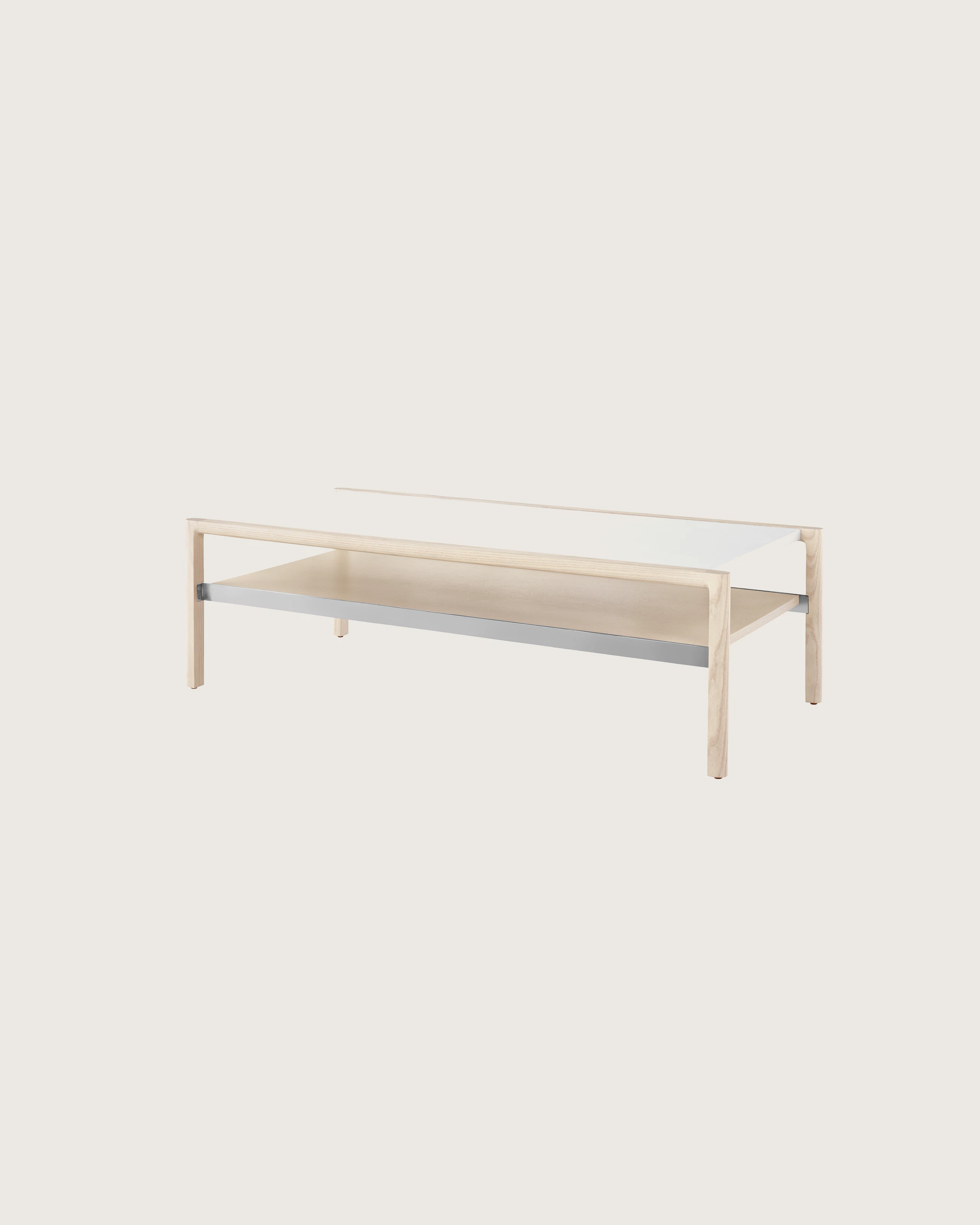 A rectangular Brabo Table with a leather-wrapped top, wood shelf, and metal frame supports. Viewed at an angle.
