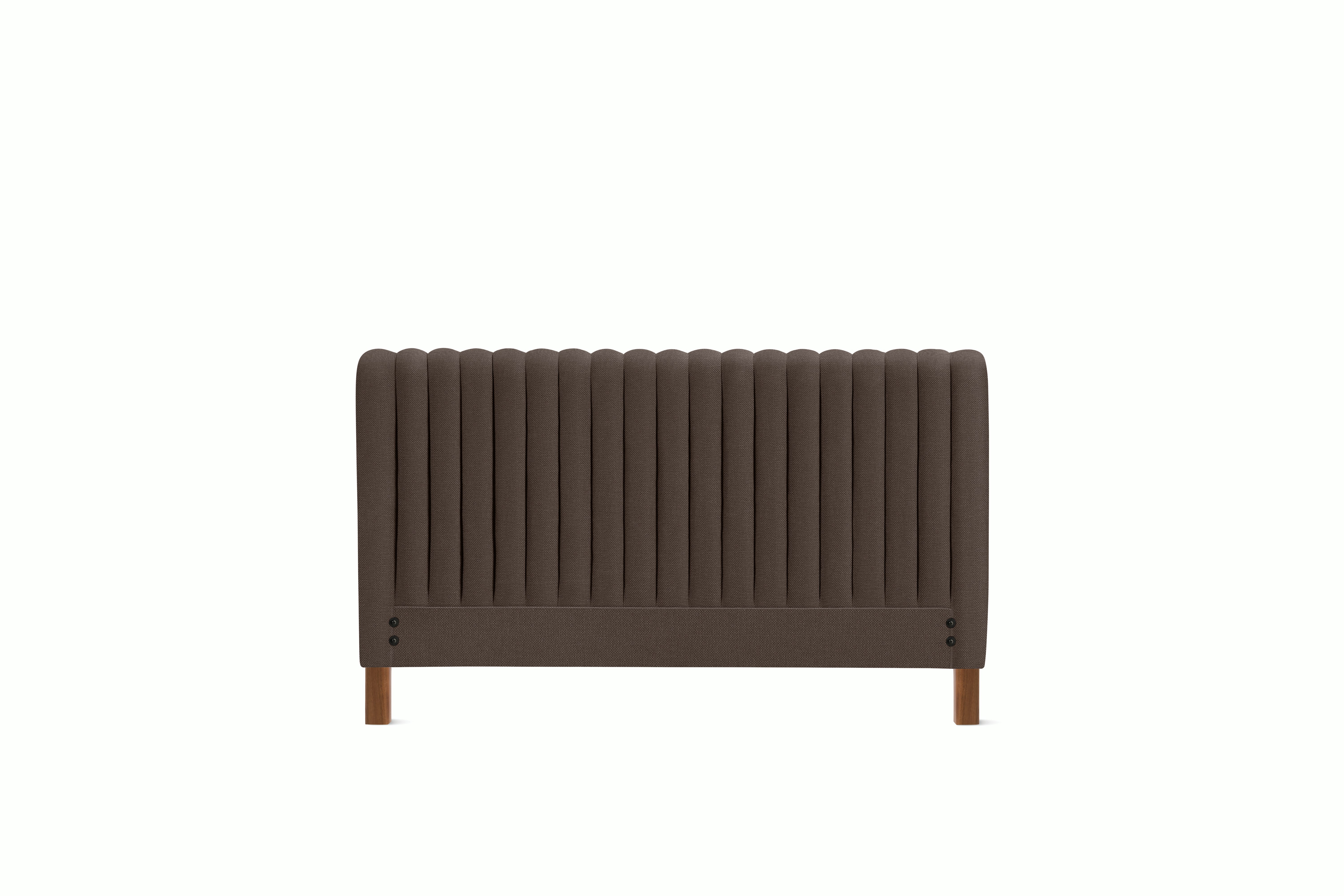 A Charlotte Headboard in Hollow viewed from an angle.