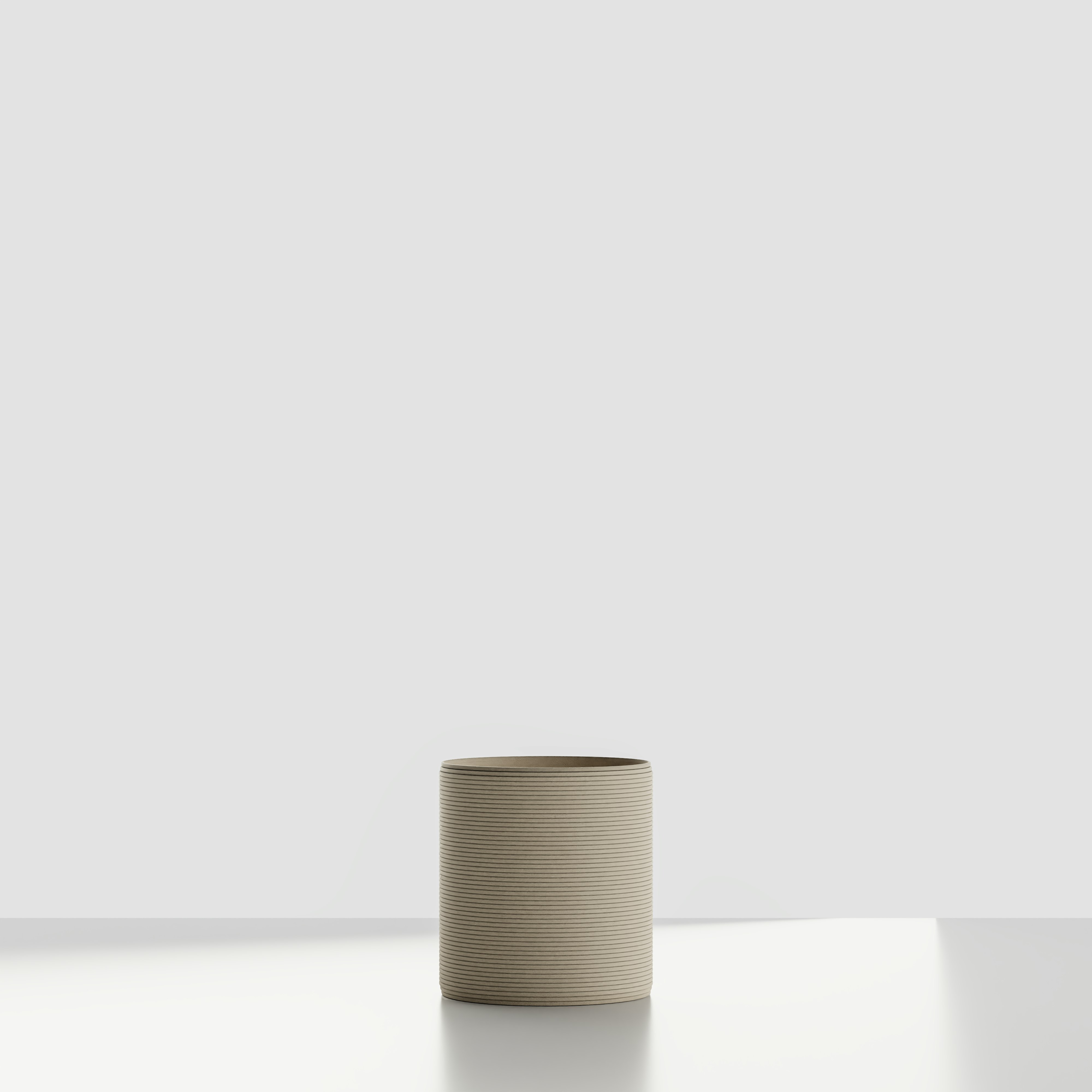 A Solana 3D Printed Concrete Planter in Desert Dawn Viewed from the front.