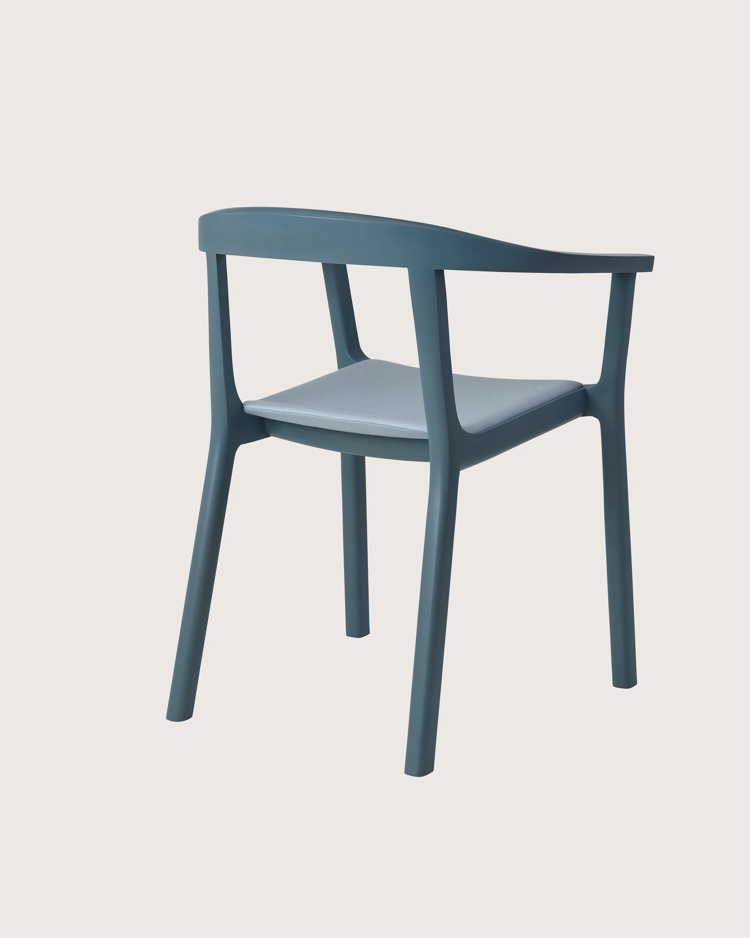 Lijn Armchair by Carole Baijings for Geiger in Nordic Blue frame upholstered with Maharam Valor in Alfresco, angled back view on a white sweep.