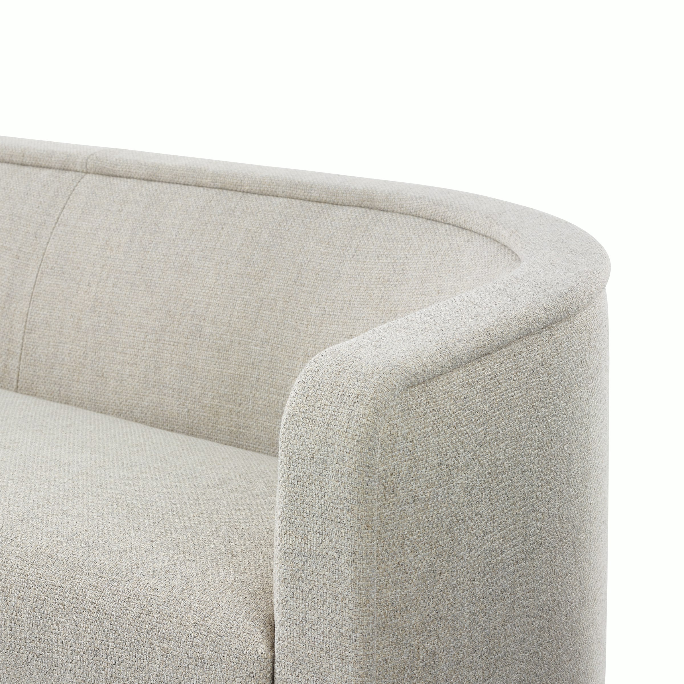 Close up of a U-Series Settee upholstered in a light neutral fabric.