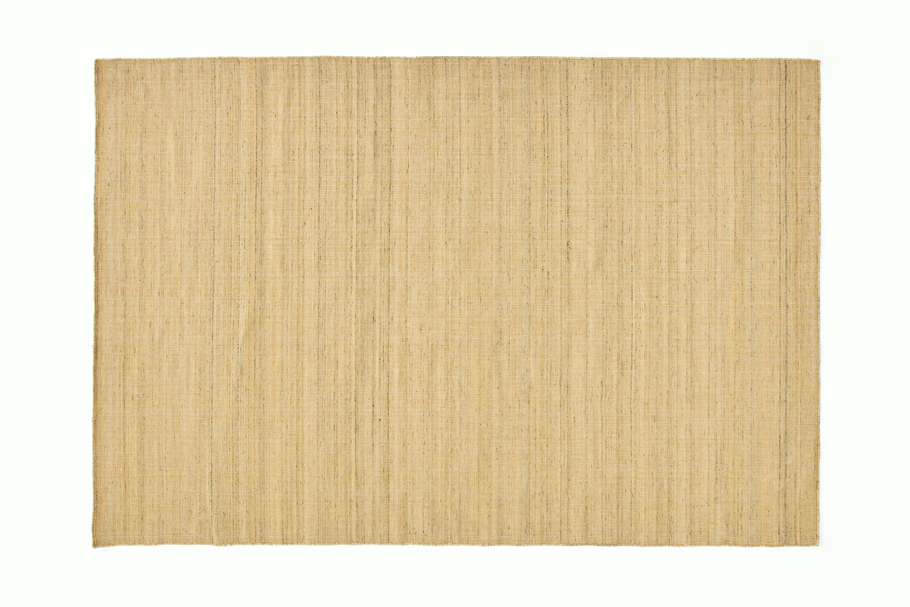 A Haze Outdoor Rug in Yellow viewed from the front.