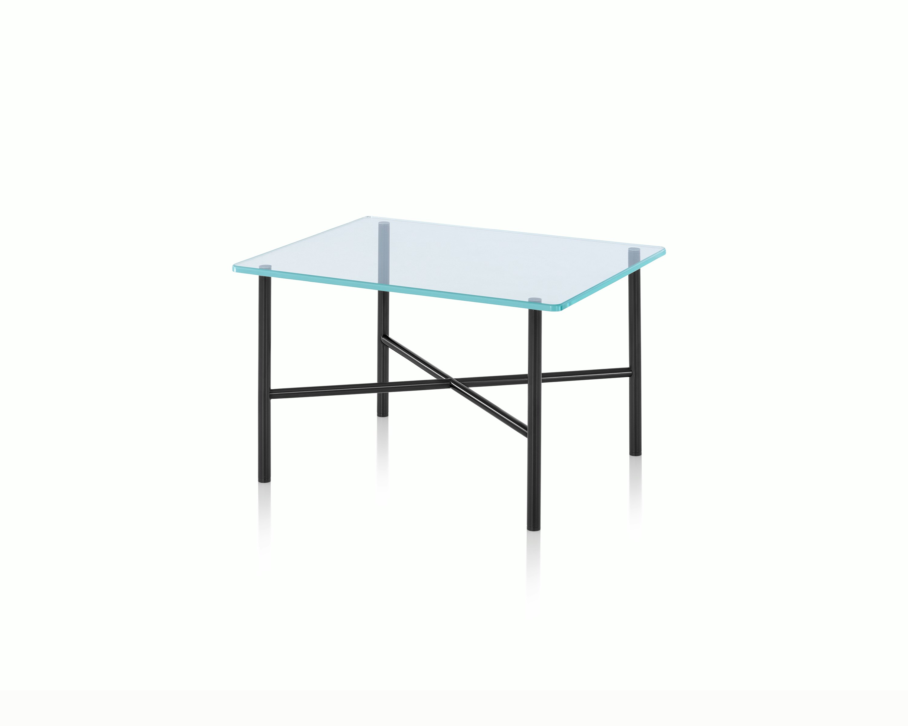 Angled view of a Layer side table with a glass top and black metal cross braces.
