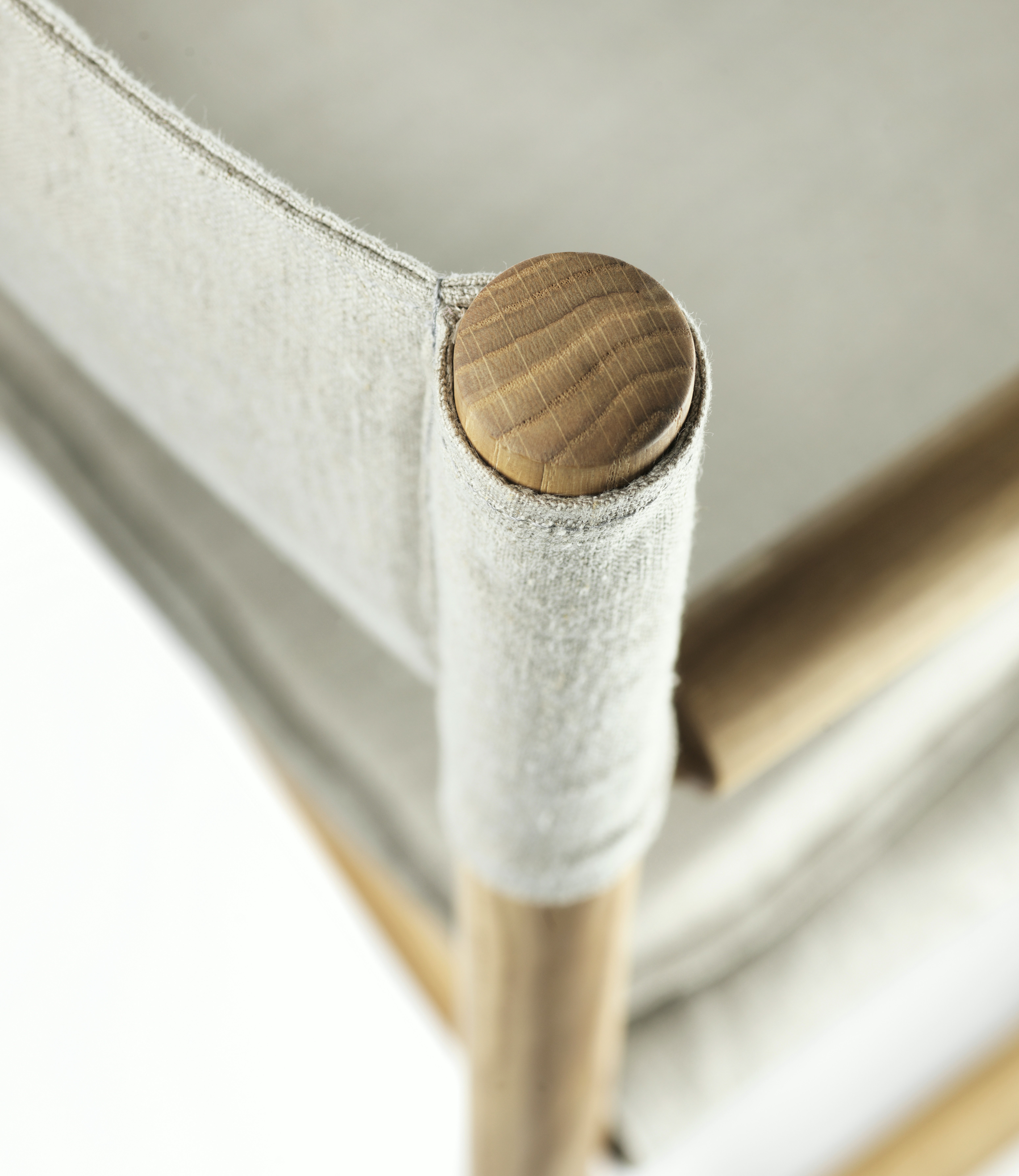A detailed look at a J138 Folding Chair in Oiled Oak.