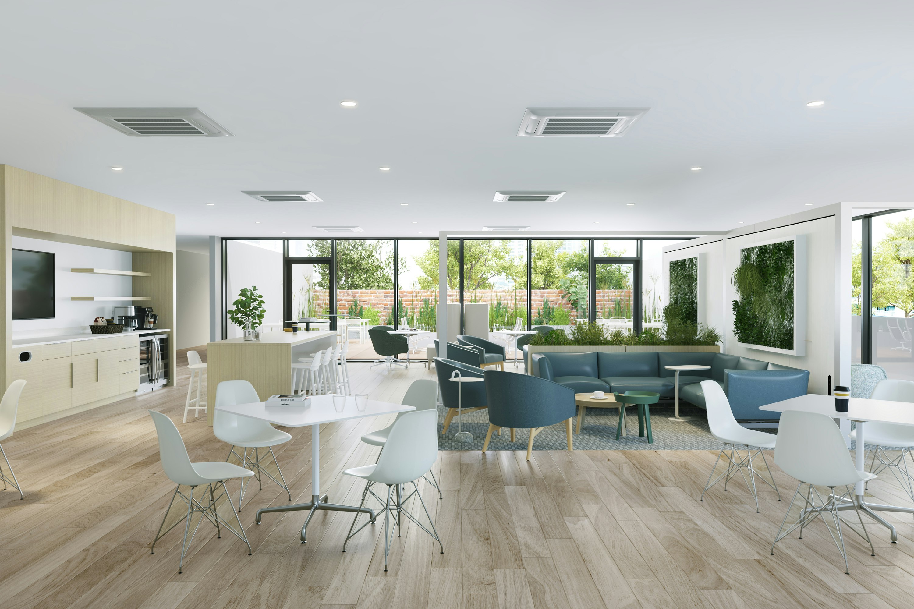 Lounge area with coffee bar furnished with white Eames Molded Plastic Chairs, Eames Tables, and blue Sophora Lounge Chairs.